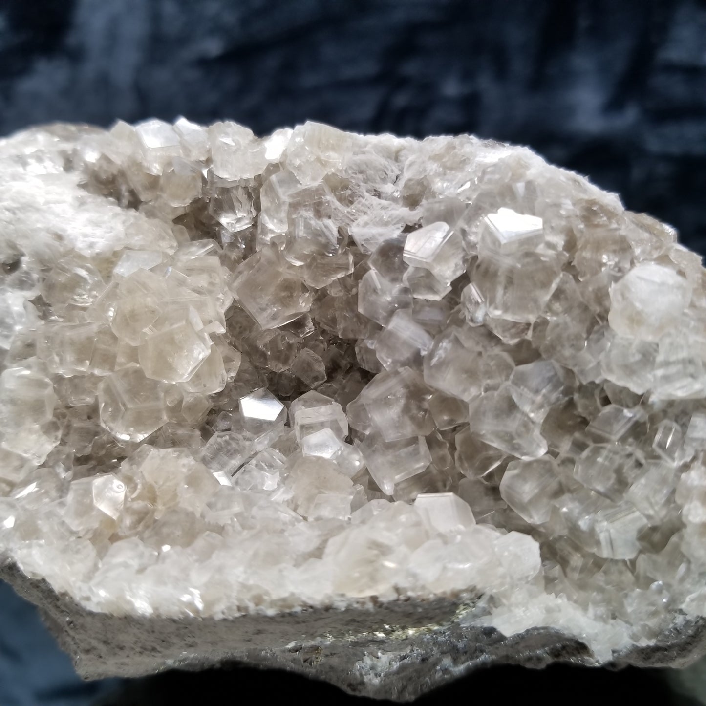 #33000 Clear Nailhead Spar Calcite on Chalcopyrite ore and multiple small fossils in the matrix