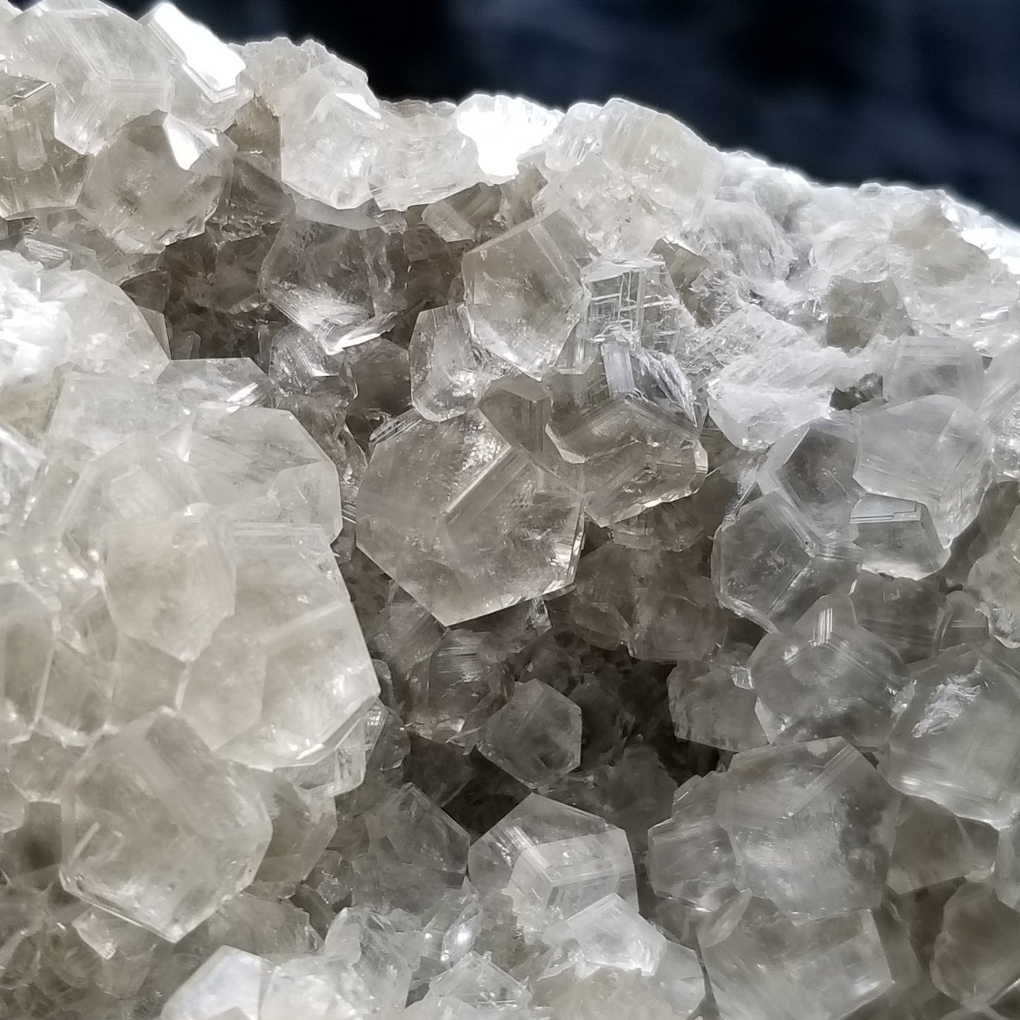 #33000 Clear Nailhead Spar Calcite on Chalcopyrite ore and multiple small fossils in the matrix