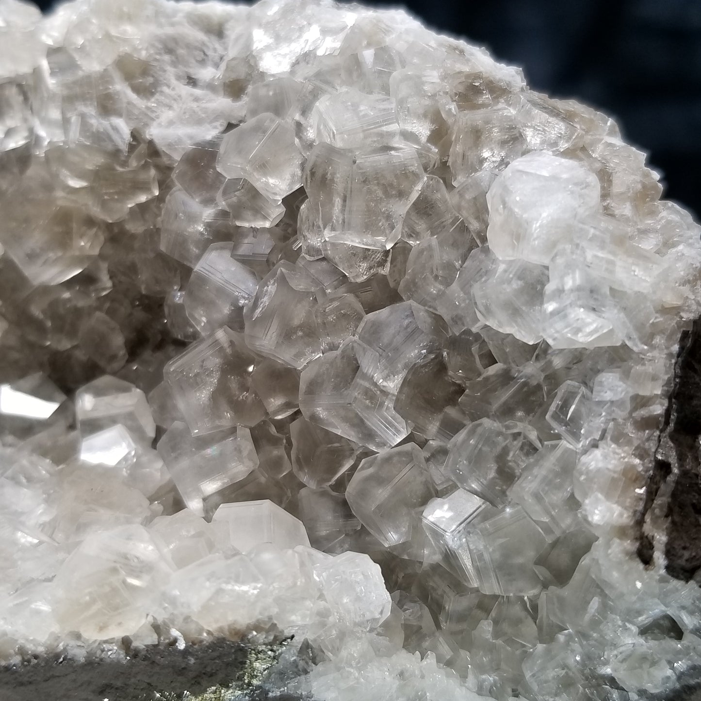 #33000 Clear Nailhead Spar Calcite on Chalcopyrite ore and multiple small fossils in the matrix