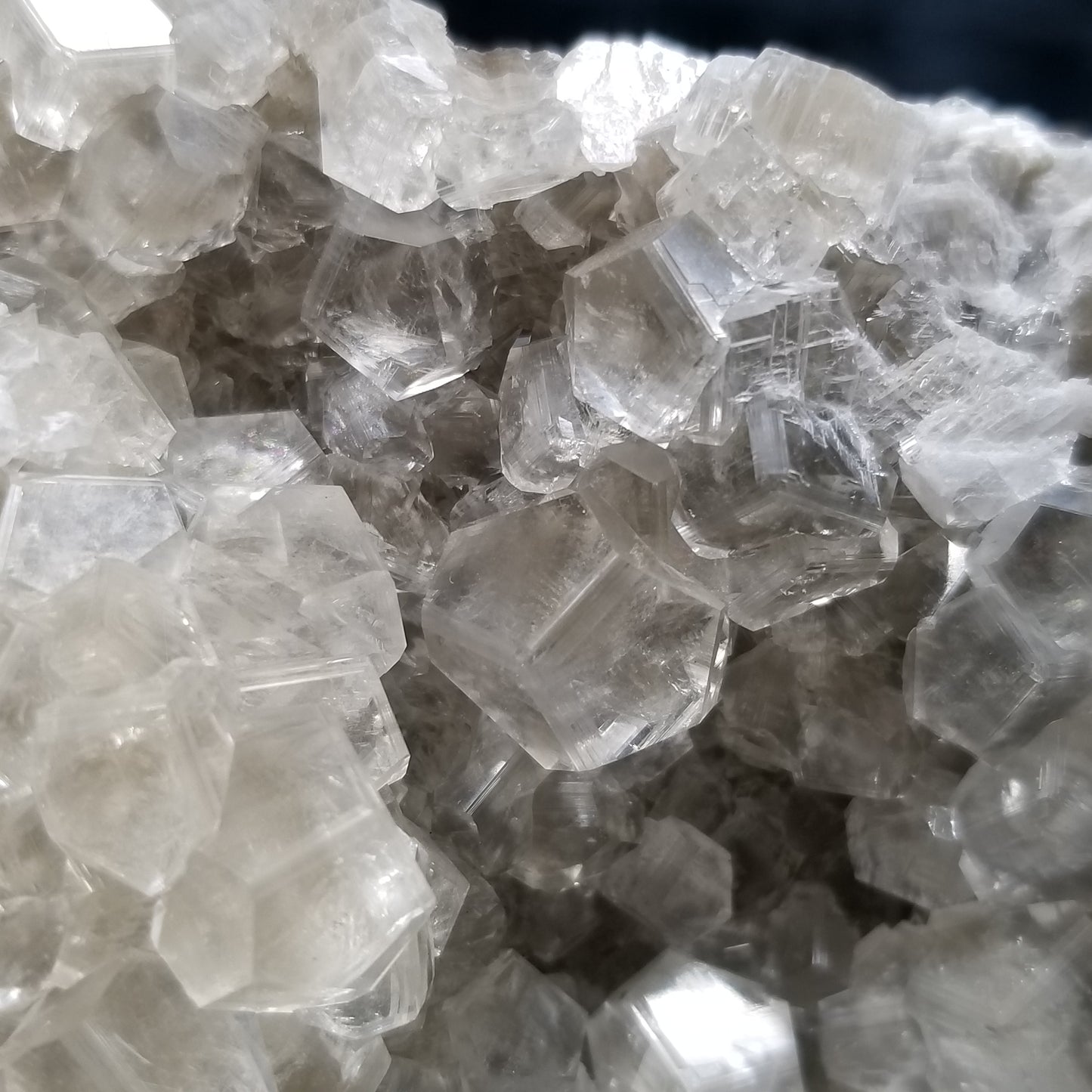 #33000 Clear Nailhead Spar Calcite on Chalcopyrite ore and multiple small fossils in the matrix