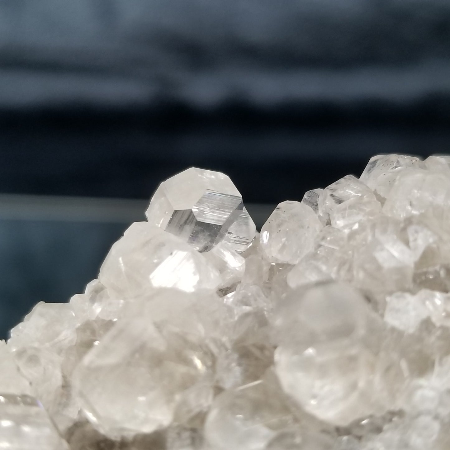 #33001 Super clear Nailhead Spar cluster, Chalcopyrite ore and multiple fossils in the matrix