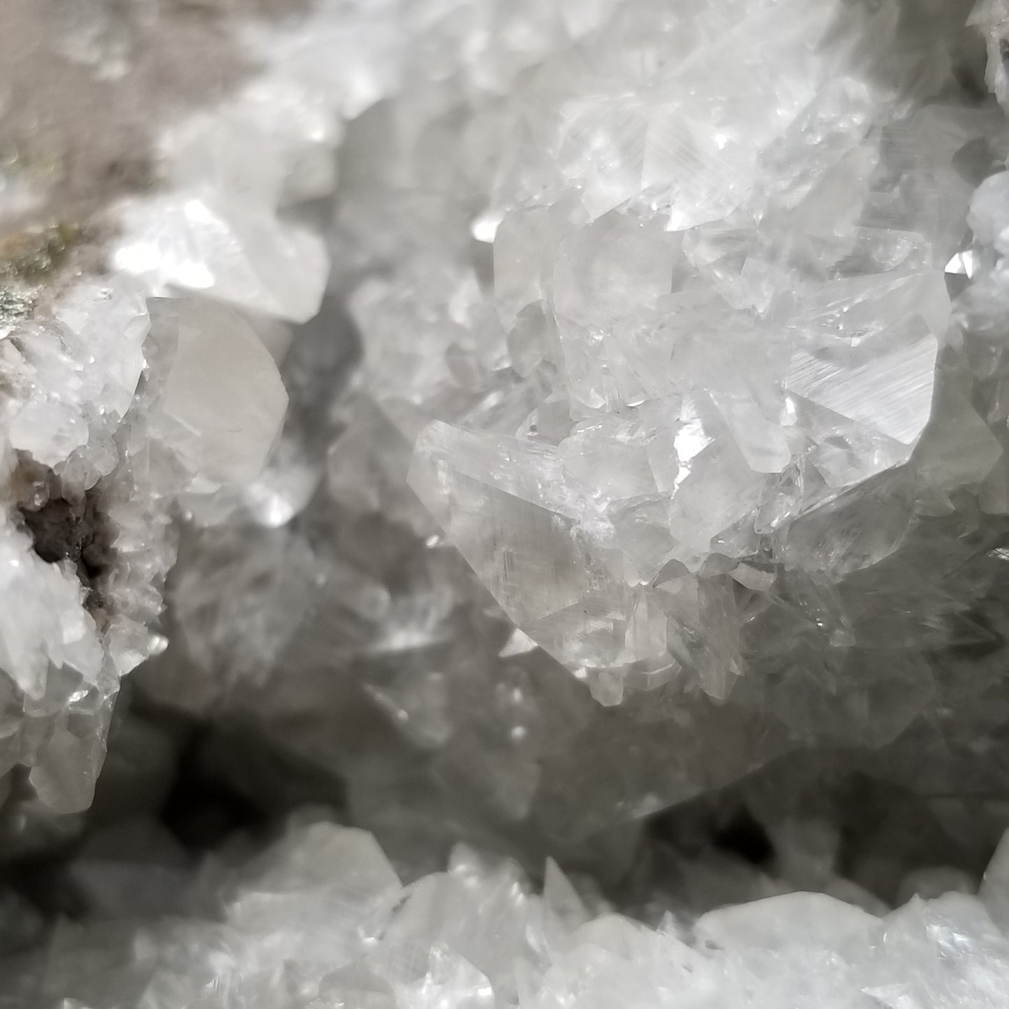 #33008 Super clear Nailhead Spar Calcite geode, Chalcopyrite ore and multiple small fossils in the matrix