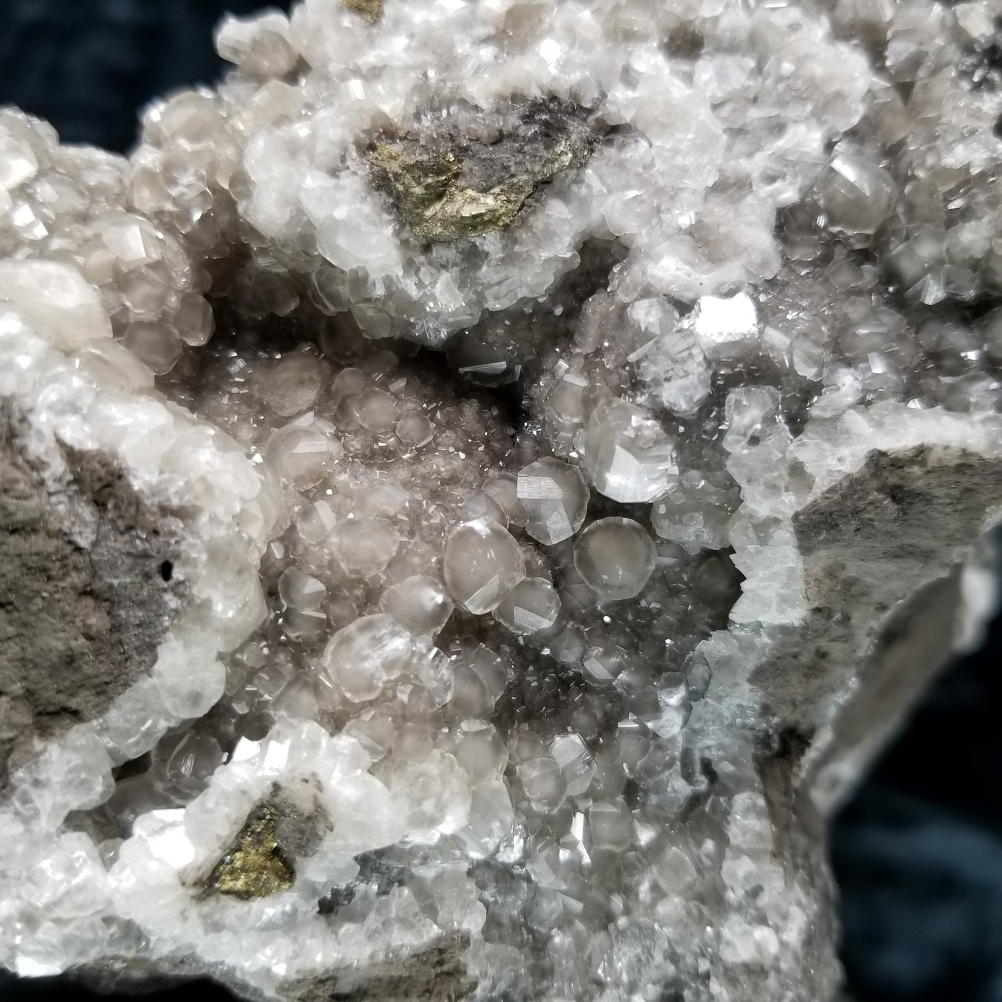 #33014 Super clear Nailhead Spar Calcite geode, Chalcopyrite ore and multiple small fossils in the matrix