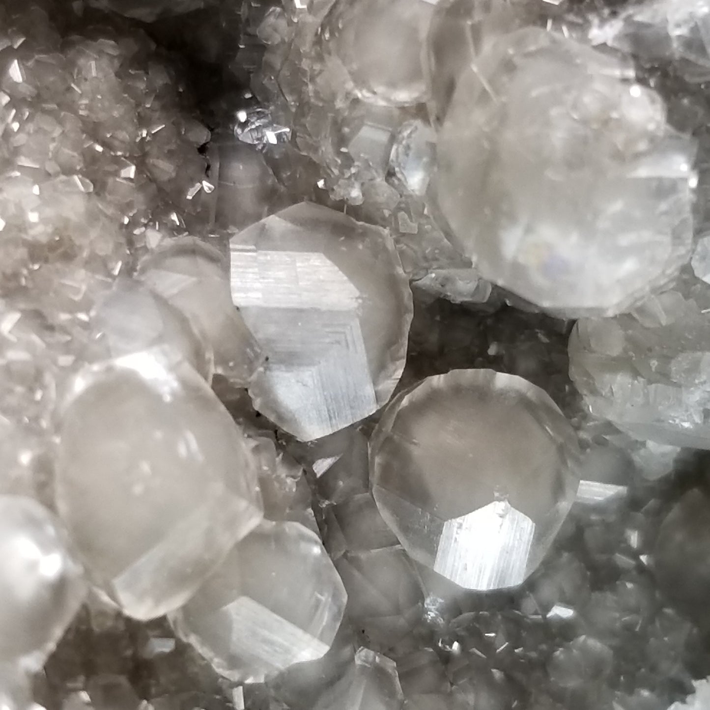 #33014 Super clear Nailhead Spar Calcite geode, Chalcopyrite ore and multiple small fossils in the matrix