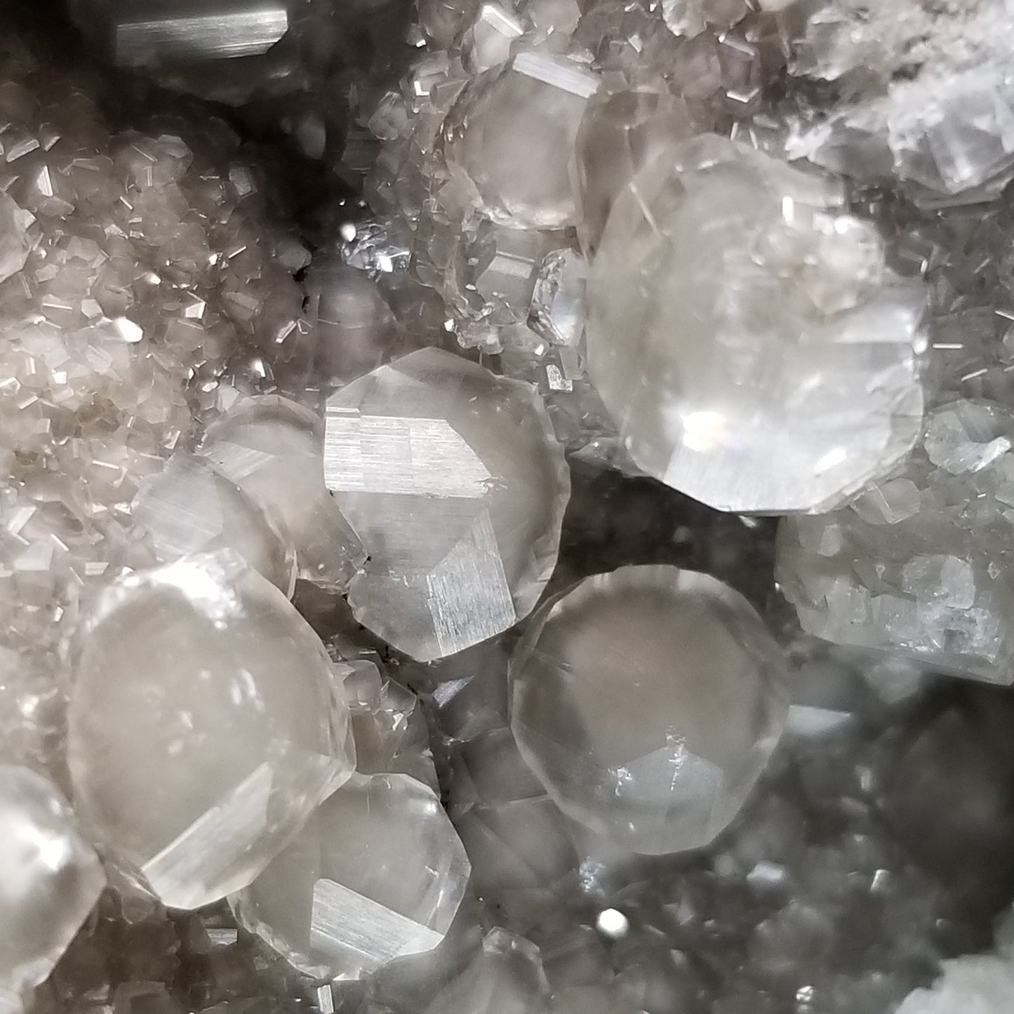 #33014 Super clear Nailhead Spar Calcite geode, Chalcopyrite ore and multiple small fossils in the matrix