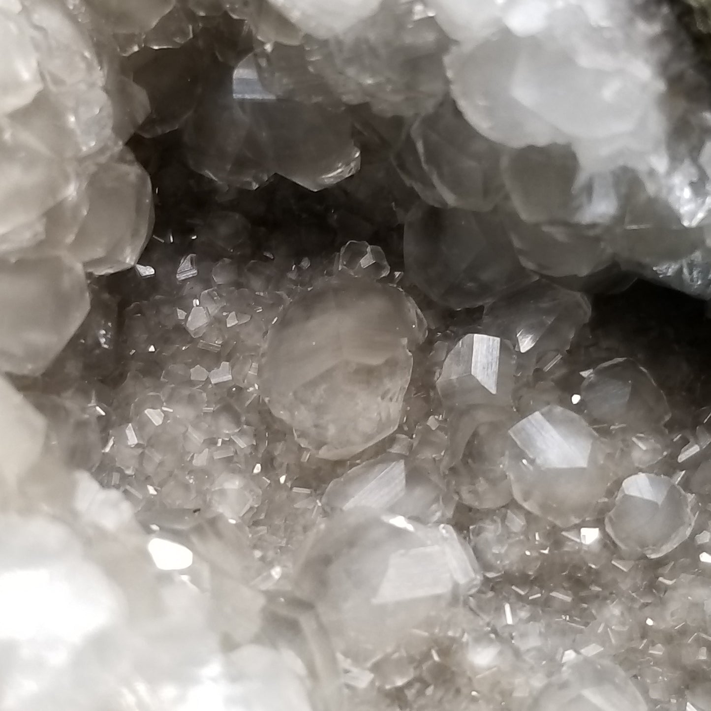 #33014 Super clear Nailhead Spar Calcite geode, Chalcopyrite ore and multiple small fossils in the matrix