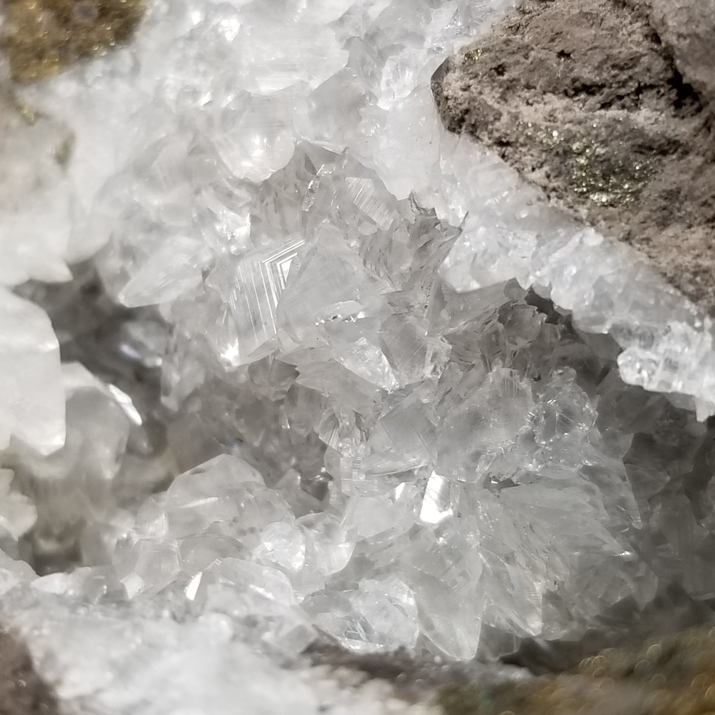 #33009 Super clear Nailhead Spar Calcite geode, Chalcopyrite ore and multiple small fossils in the matrix