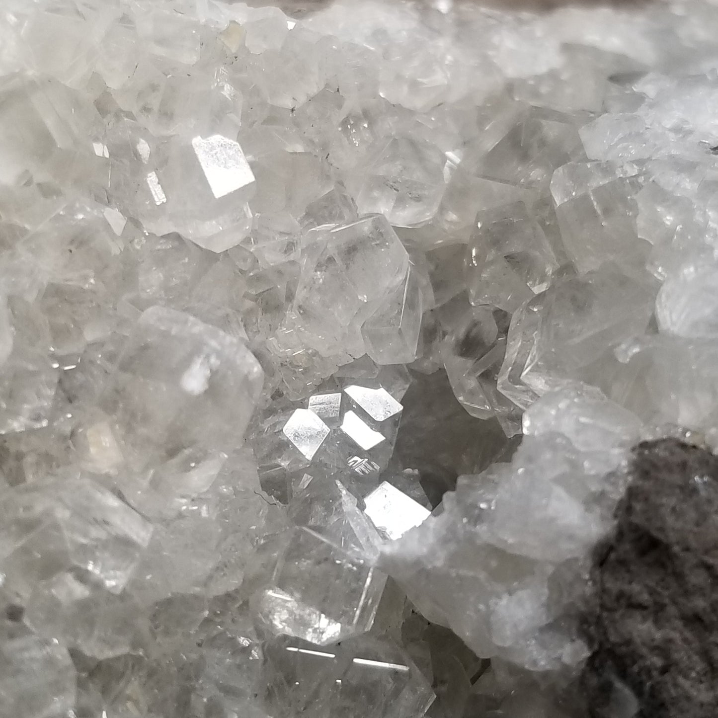 #33020 Super clear Nailhead Spar Calcite geode, Chalcopyrite ore and multiple small fossils in the matrix