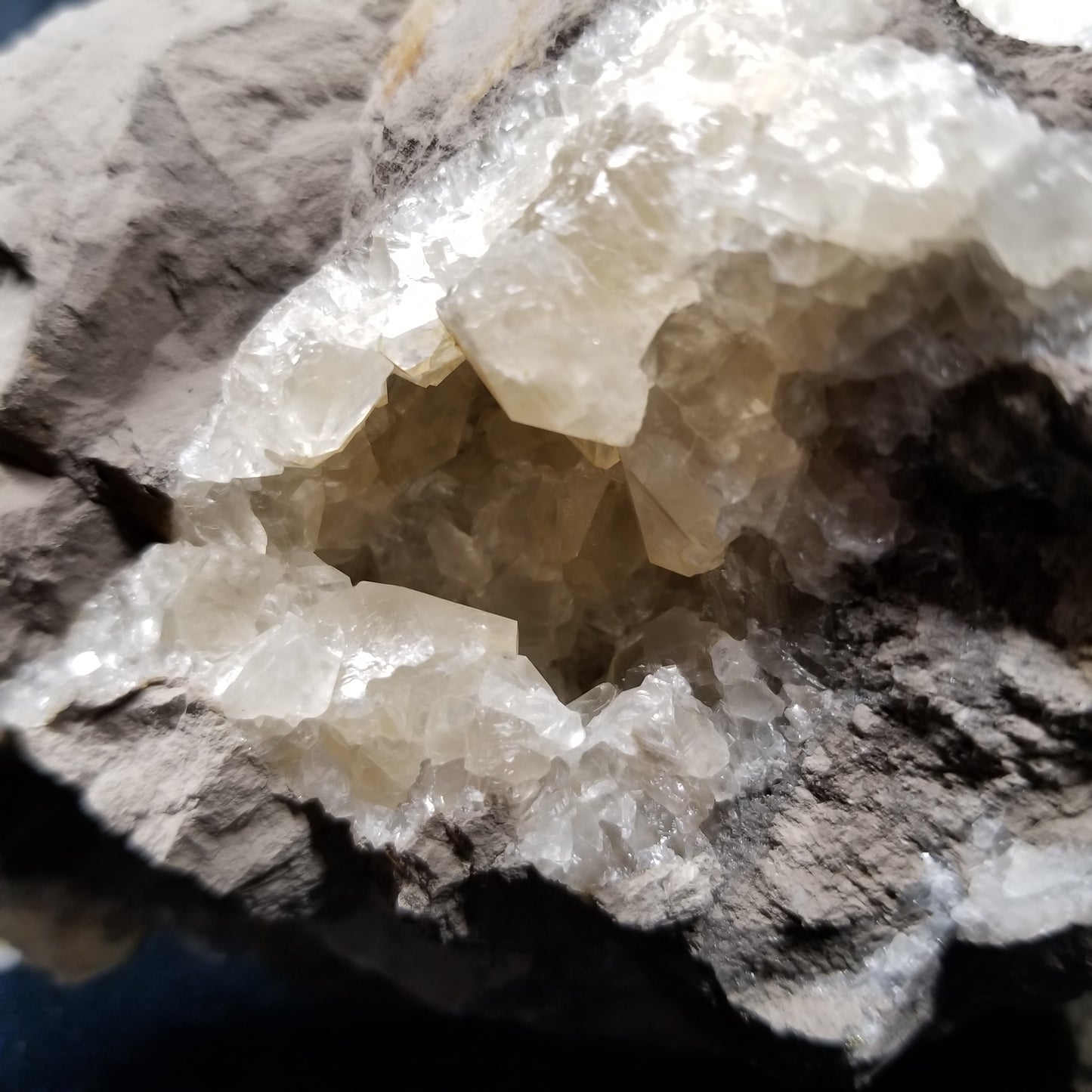 #33024 Super clear Nailhead Spar Calcite geode, Chalcopyrite ore and multiple small fossils in the matrix