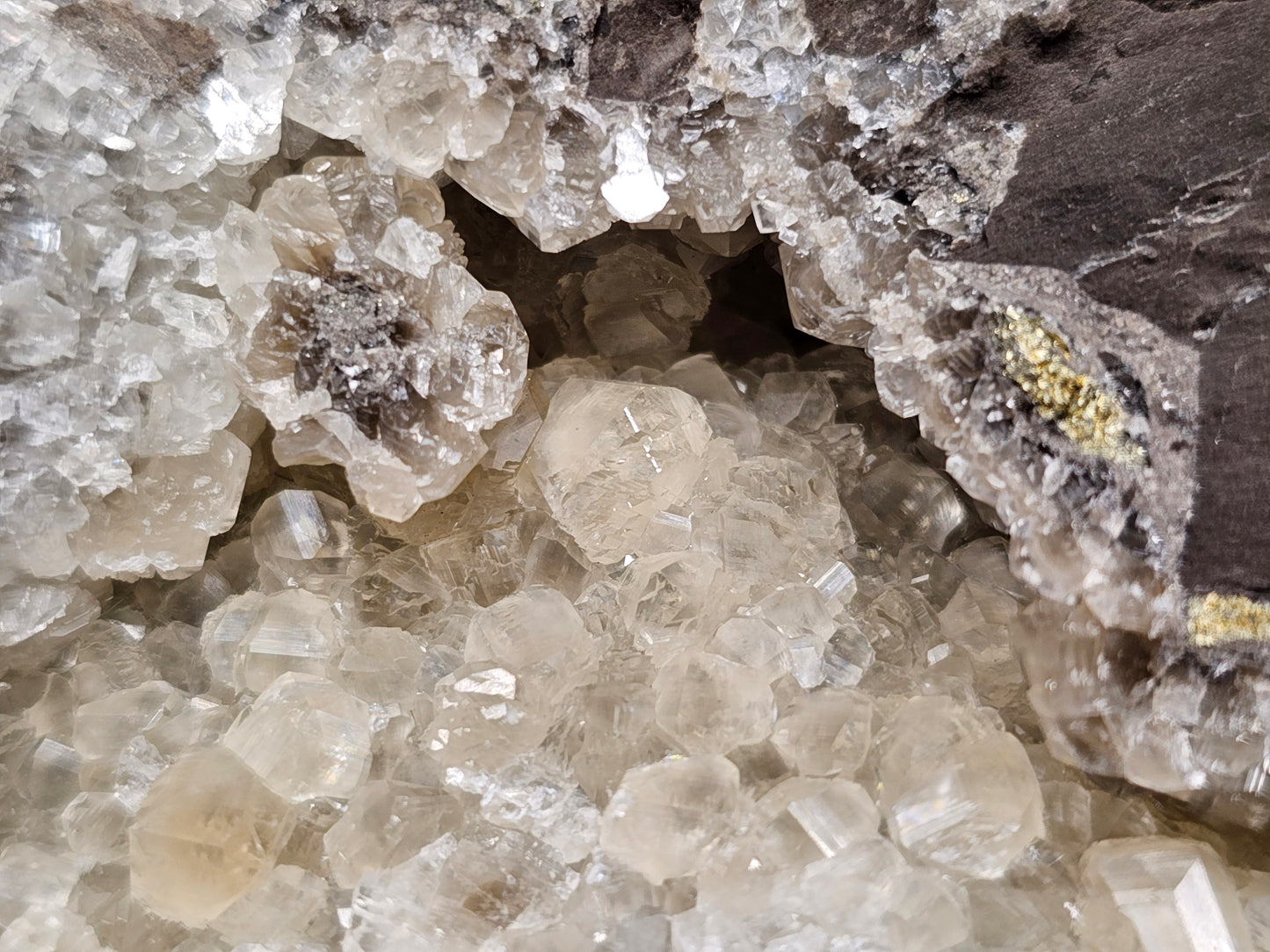 #33030 Super clear Nailhead Spar Calcite geode, Chalcopyrite ore and multiple small fossils in the matrix