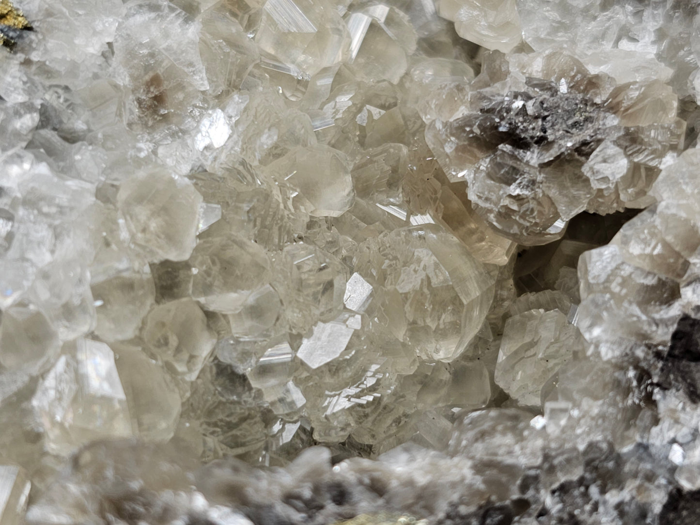 #33030 Super clear Nailhead Spar Calcite geode, Chalcopyrite ore and multiple small fossils in the matrix