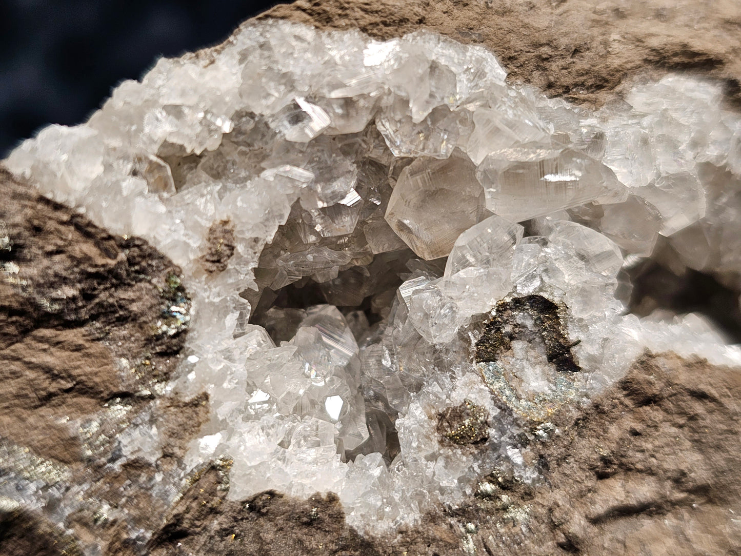 #33042 Super clear Nailhead Spar Calcite geode, Chalcopyrite ore and multiple small fossils in the matrix
