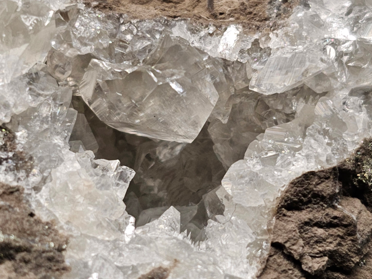 #33042 Super clear Nailhead Spar Calcite geode, Chalcopyrite ore and multiple small fossils in the matrix