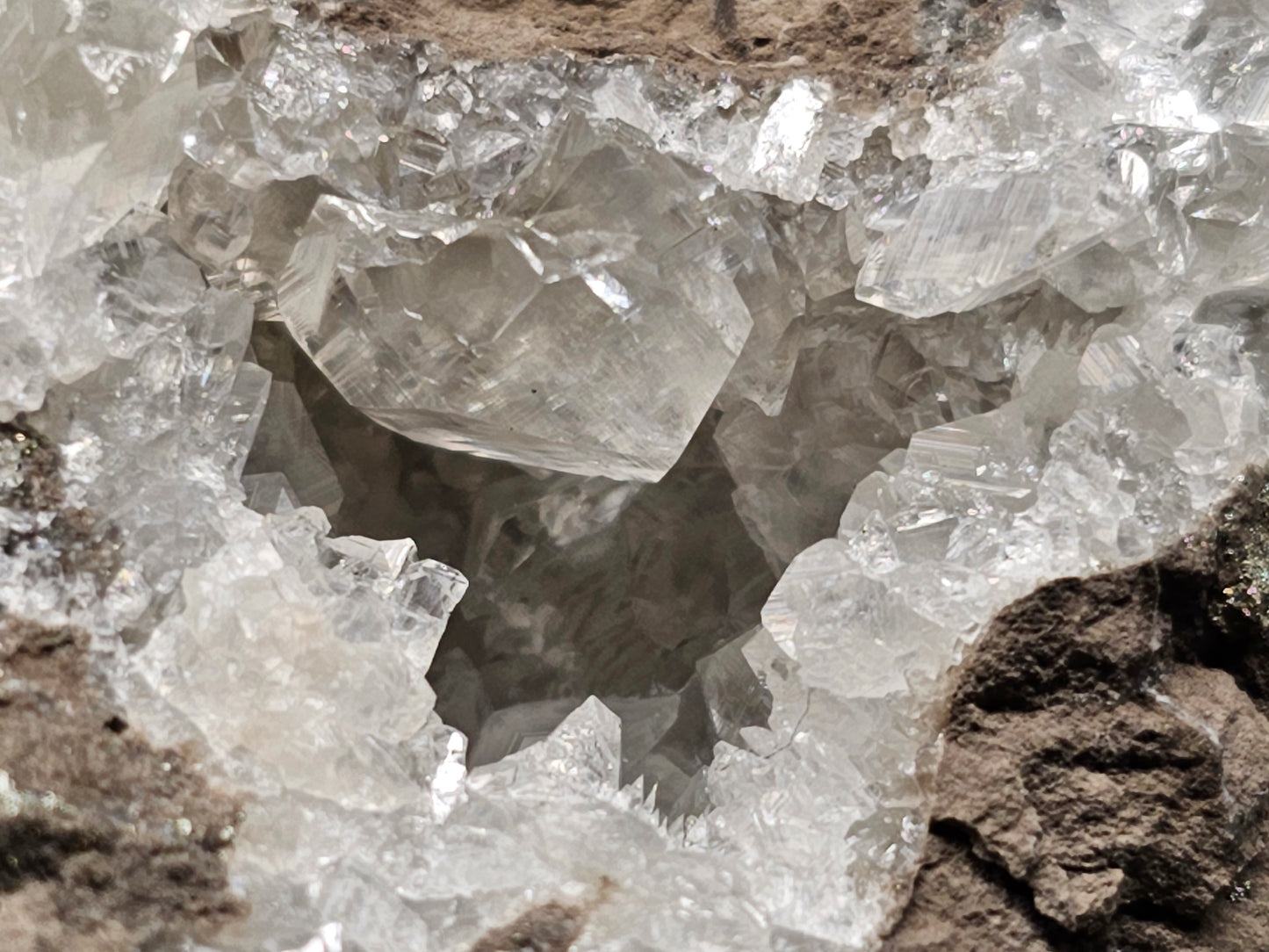 #33042 Super clear Nailhead Spar Calcite geode, Chalcopyrite ore and multiple small fossils in the matrix