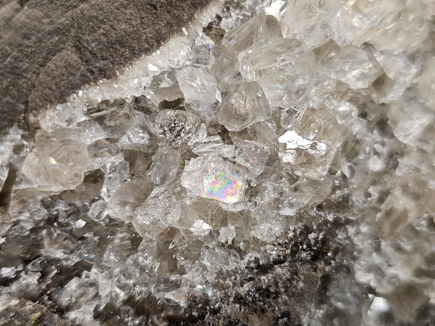 #33037 Super clear Nailhead Spar Calcite geode, Chalcopyrite ore and multiple small fossils in the matrix