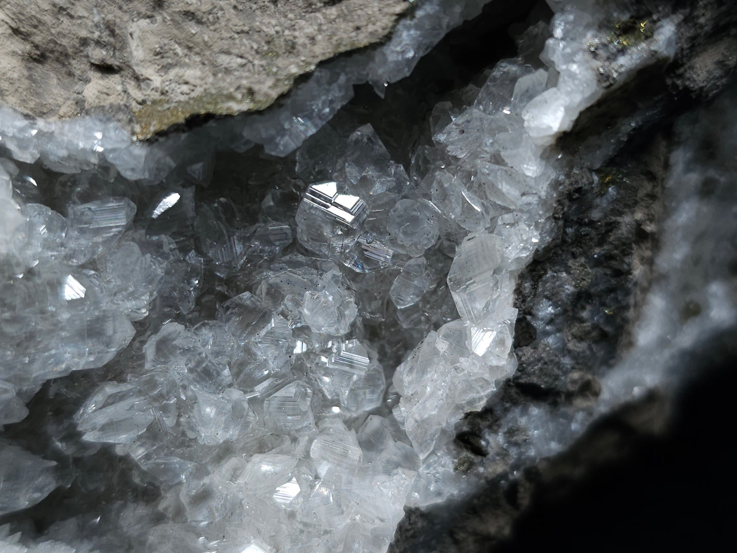 #33039 Super clear Nailhead Spar Calcite geode, Chalcopyrite ore and multiple small fossils in the matrix