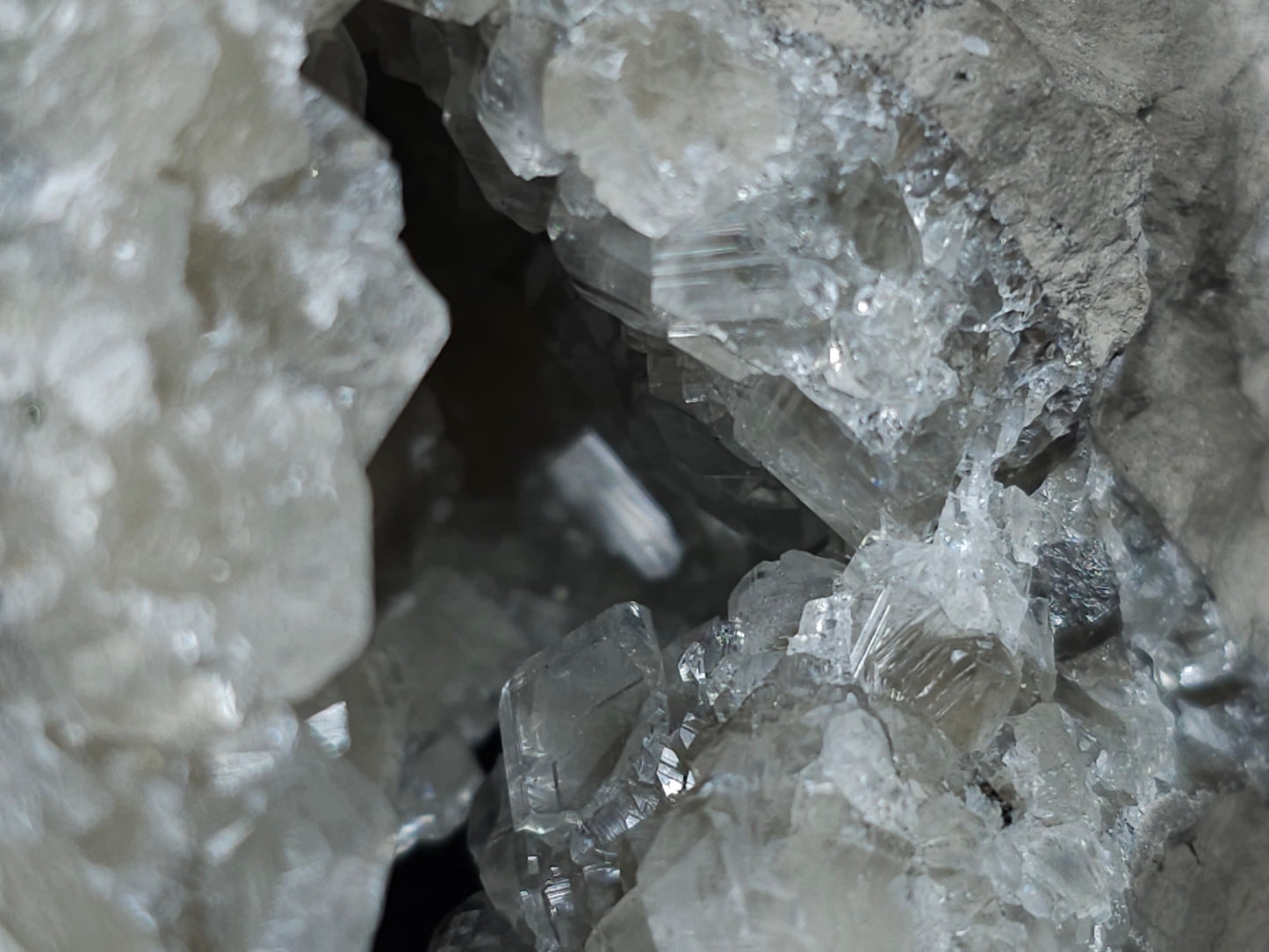 #33063 Super clear Nailhead Spar Calcite geode, Chalcopyrite ore and multiple small fossils in the matrix