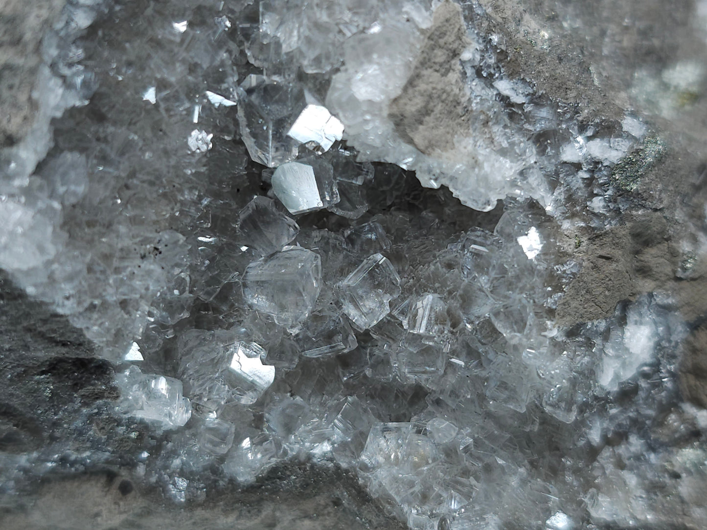 #33074 Super clear Nailhead Spar Calcite geode, Chalcopyrite ore and multiple small fossils in the matrix