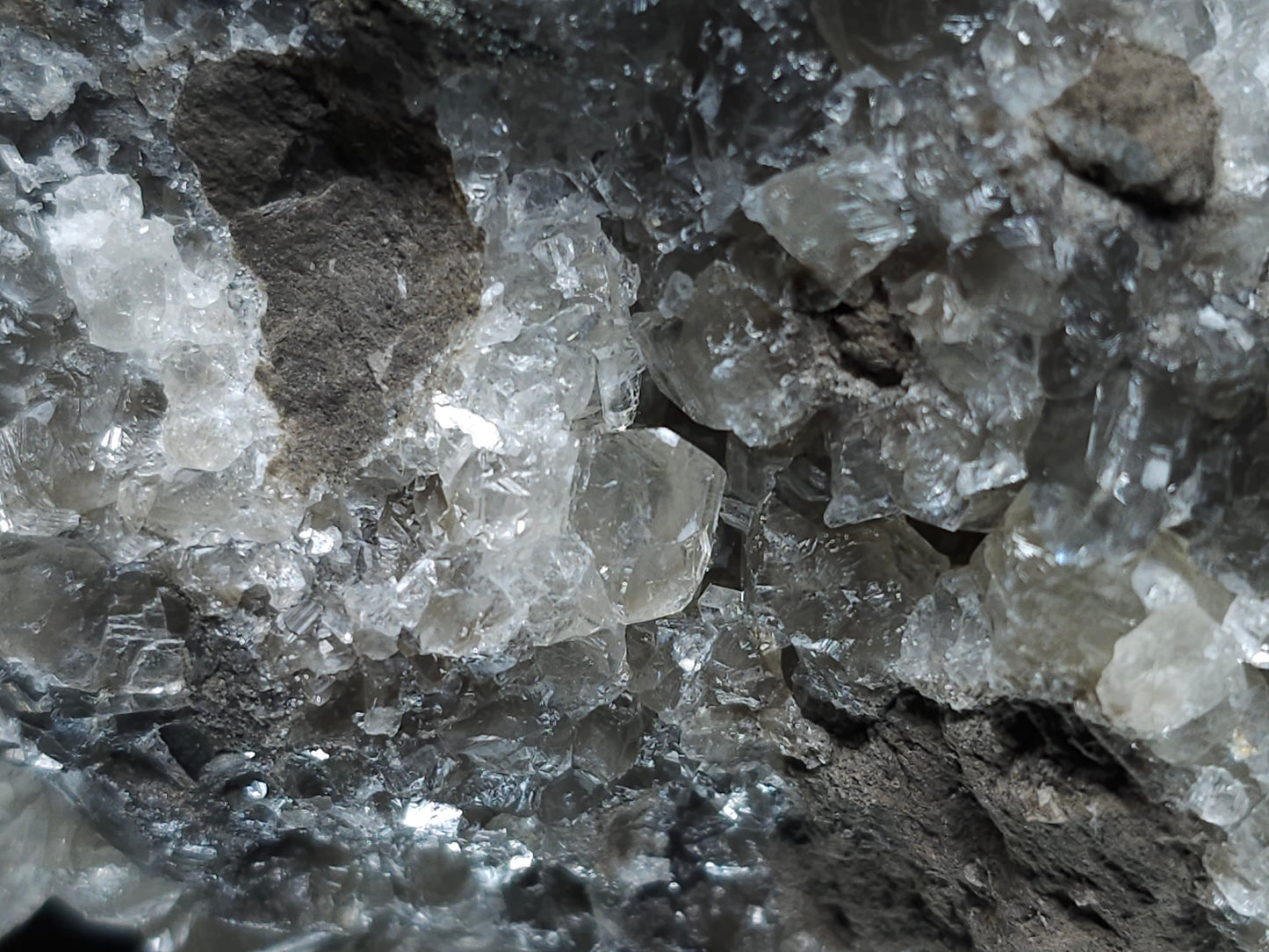 #33101 Super clear Nailhead Spar Calcite geode, Chalcopyrite ore and multiple small fossils in the matrix