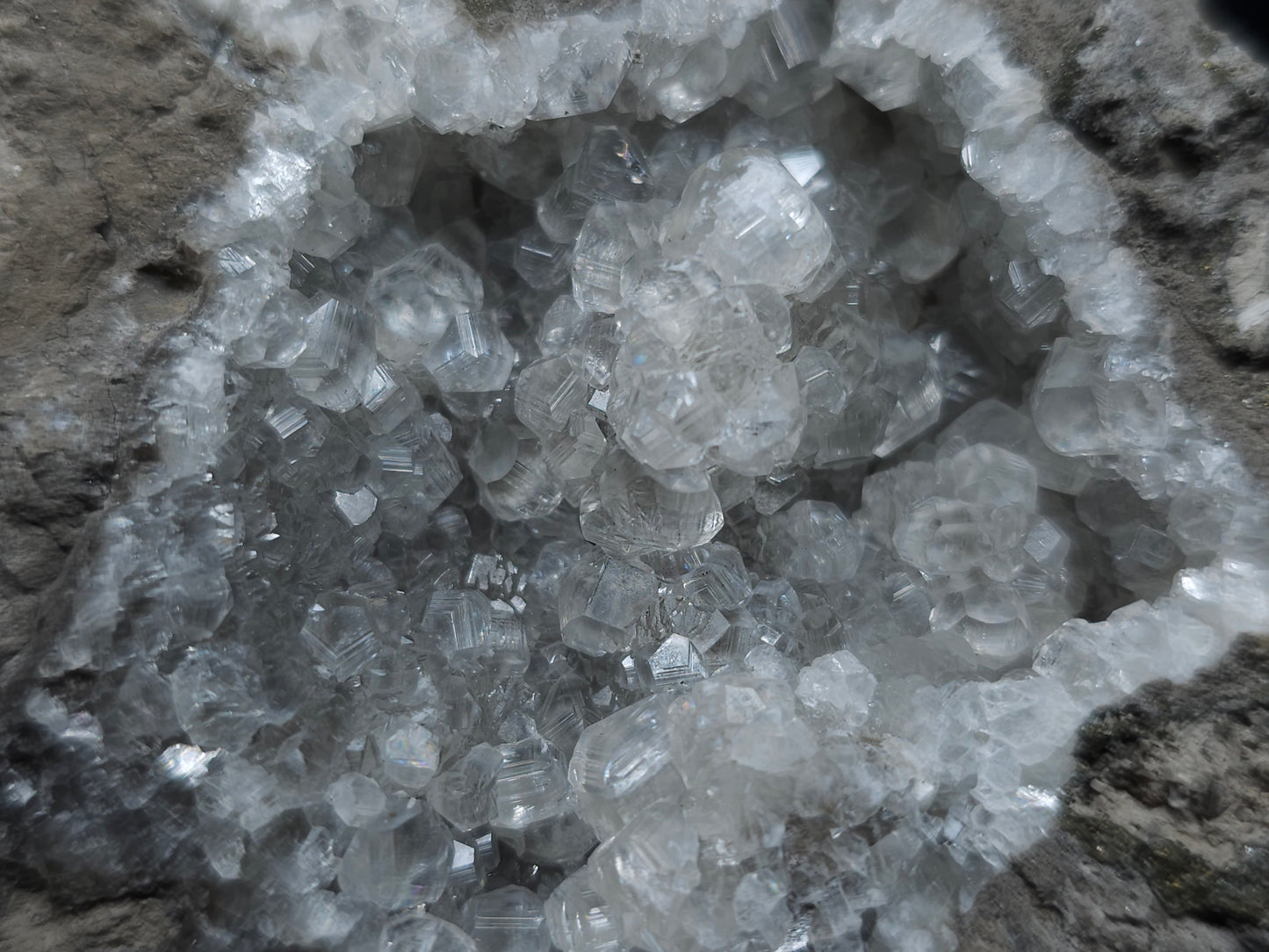 #33113 Super clear Nailhead Spar Calcite geode with Chalcopyrite ore and multiple small fossils in the matrix