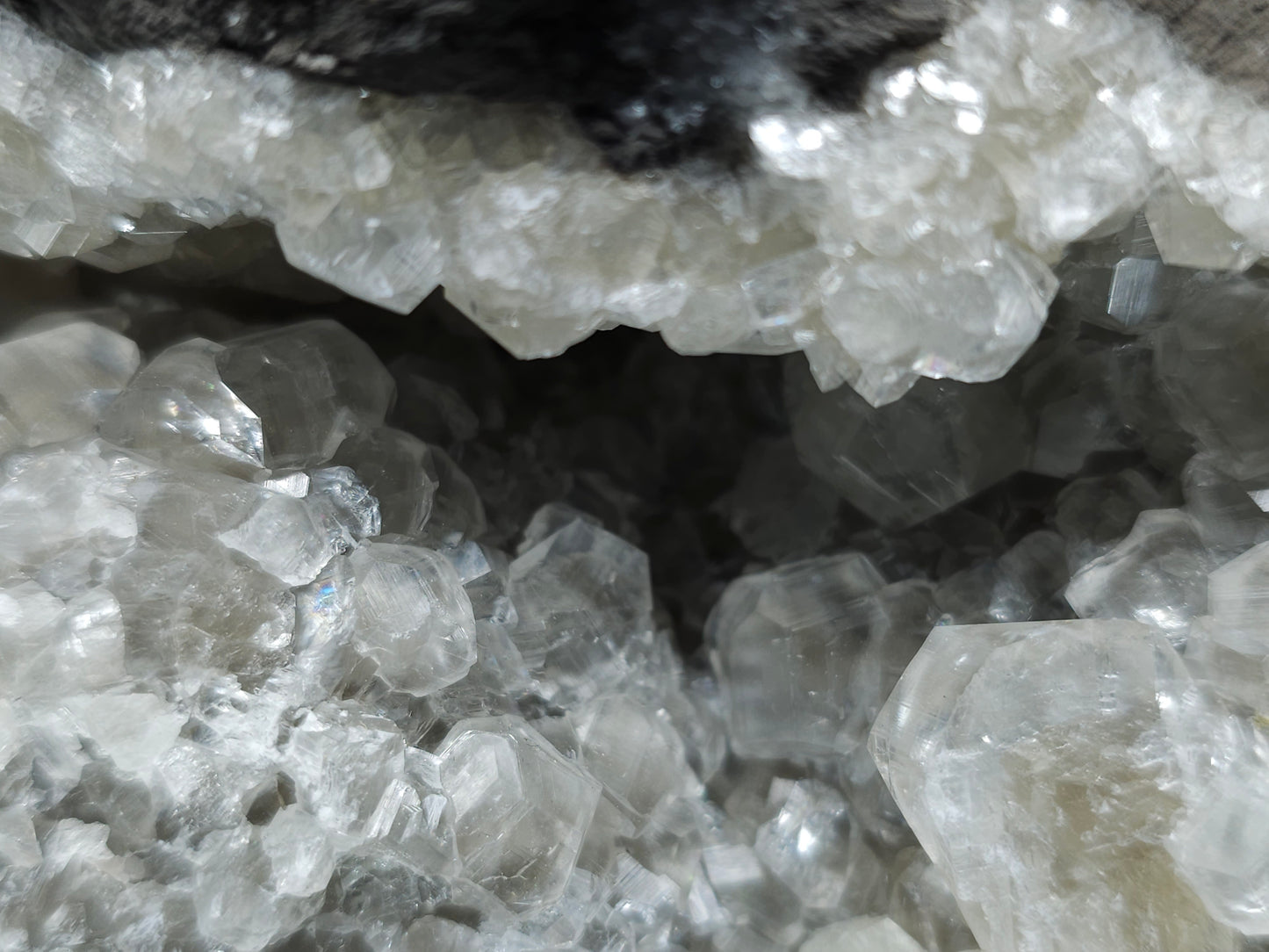 #33107 Super clear Nailhead Spar Calcite geode with Chalcopyrite ore and multiple small fossils in the matrix