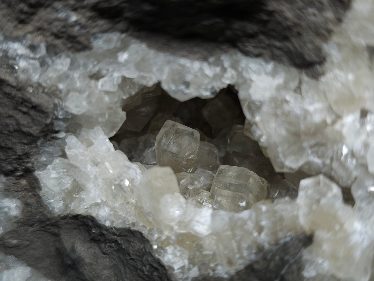 #33107 Super clear Nailhead Spar Calcite geode with Chalcopyrite ore and multiple small fossils in the matrix