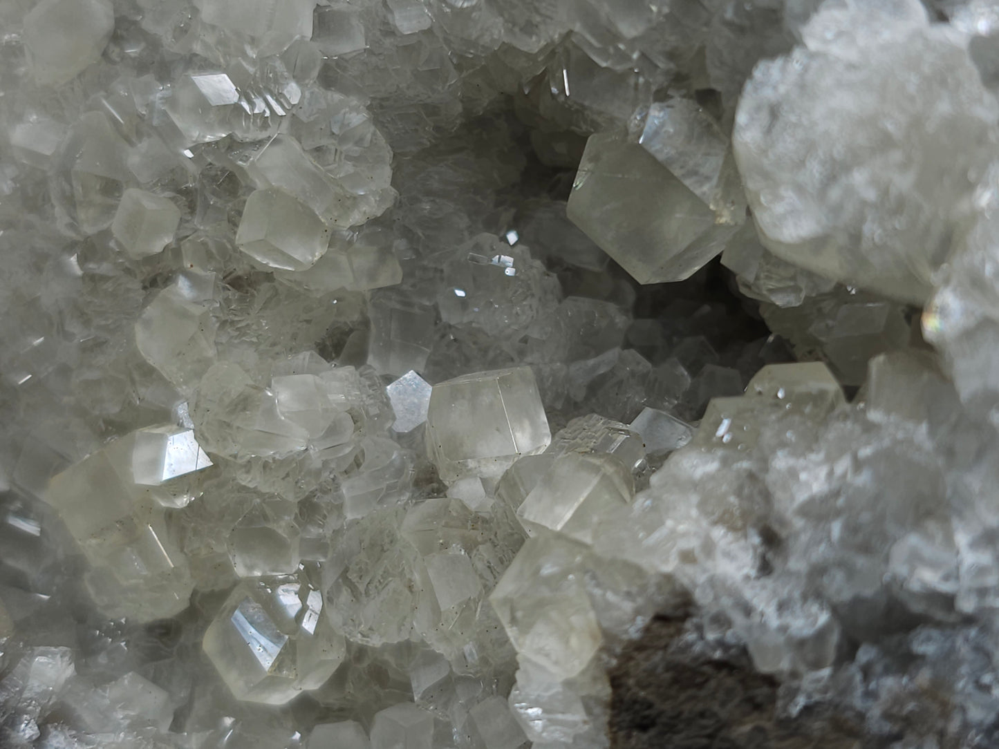#33107 Super clear Nailhead Spar Calcite geode with Chalcopyrite ore and multiple small fossils in the matrix