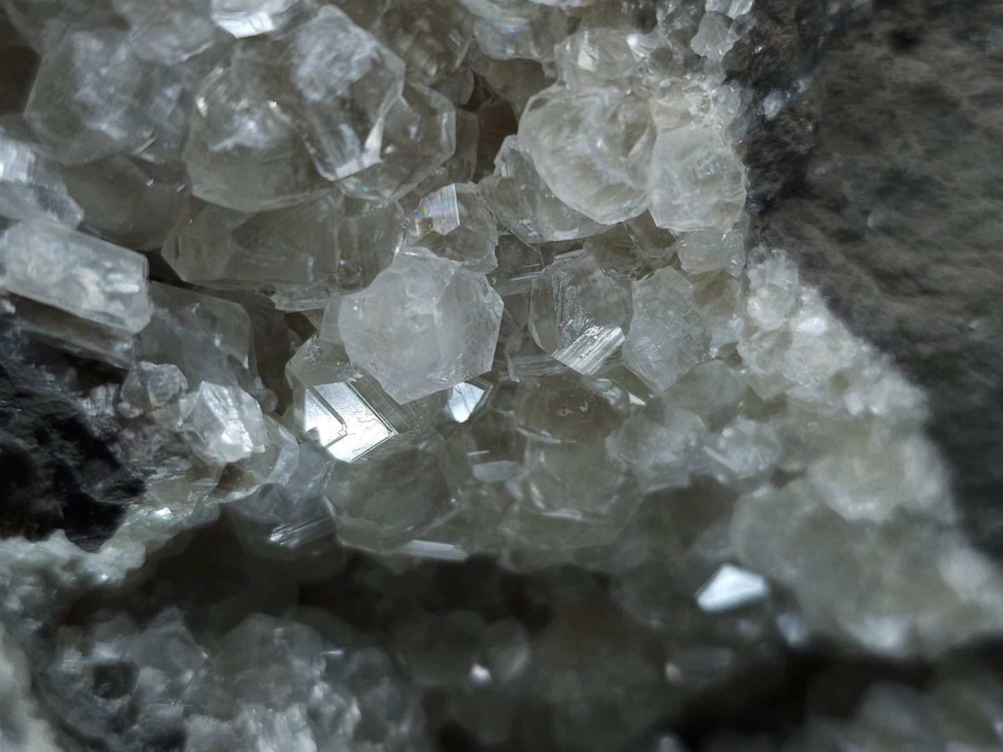 #33107 Super clear Nailhead Spar Calcite geode with Chalcopyrite ore and multiple small fossils in the matrix