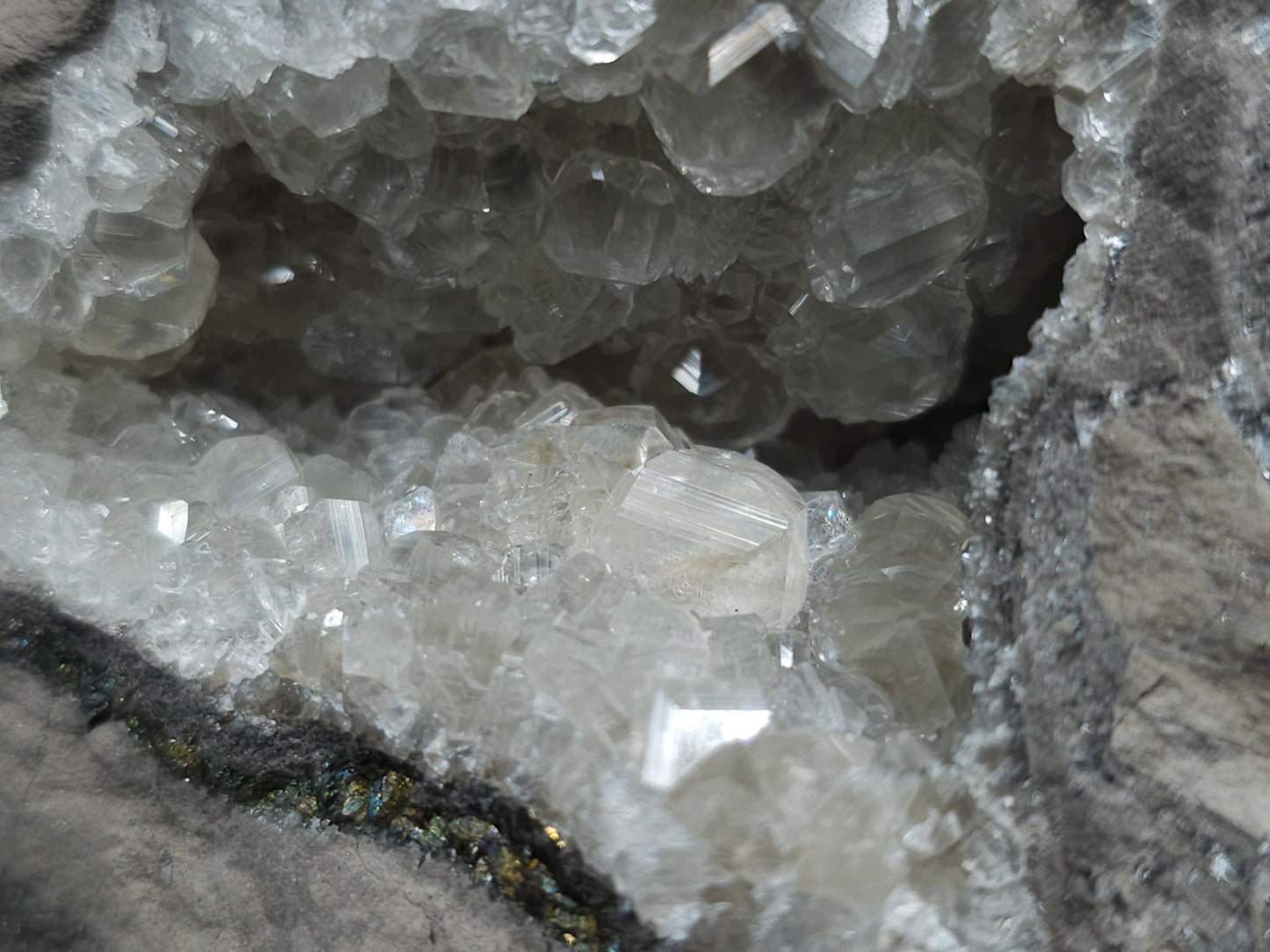 #33118 Super clear Nailhead Spar Calcite geode with Chalcopyrite ore and multiple small fossils in the matrix