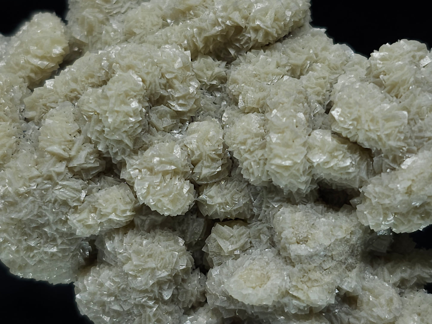 #88022 Cream-white Calcite pseudomorph after uncommon Calcite formation