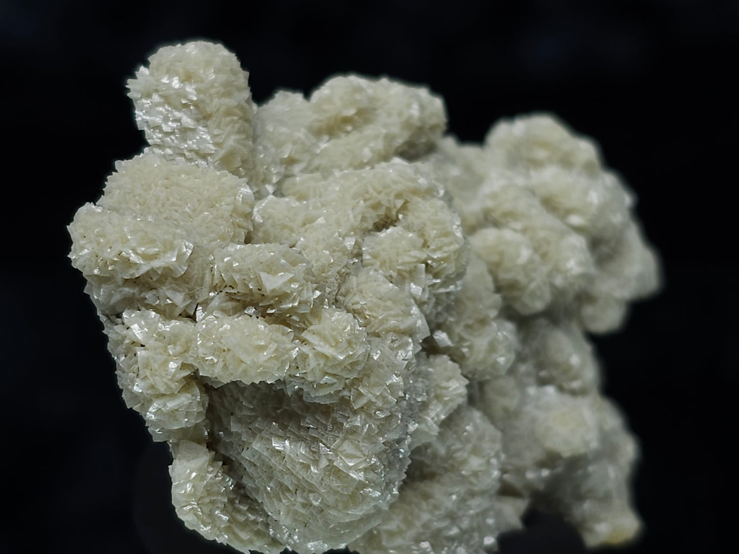 #88022 Cream-white Calcite pseudomorph after uncommon Calcite formation