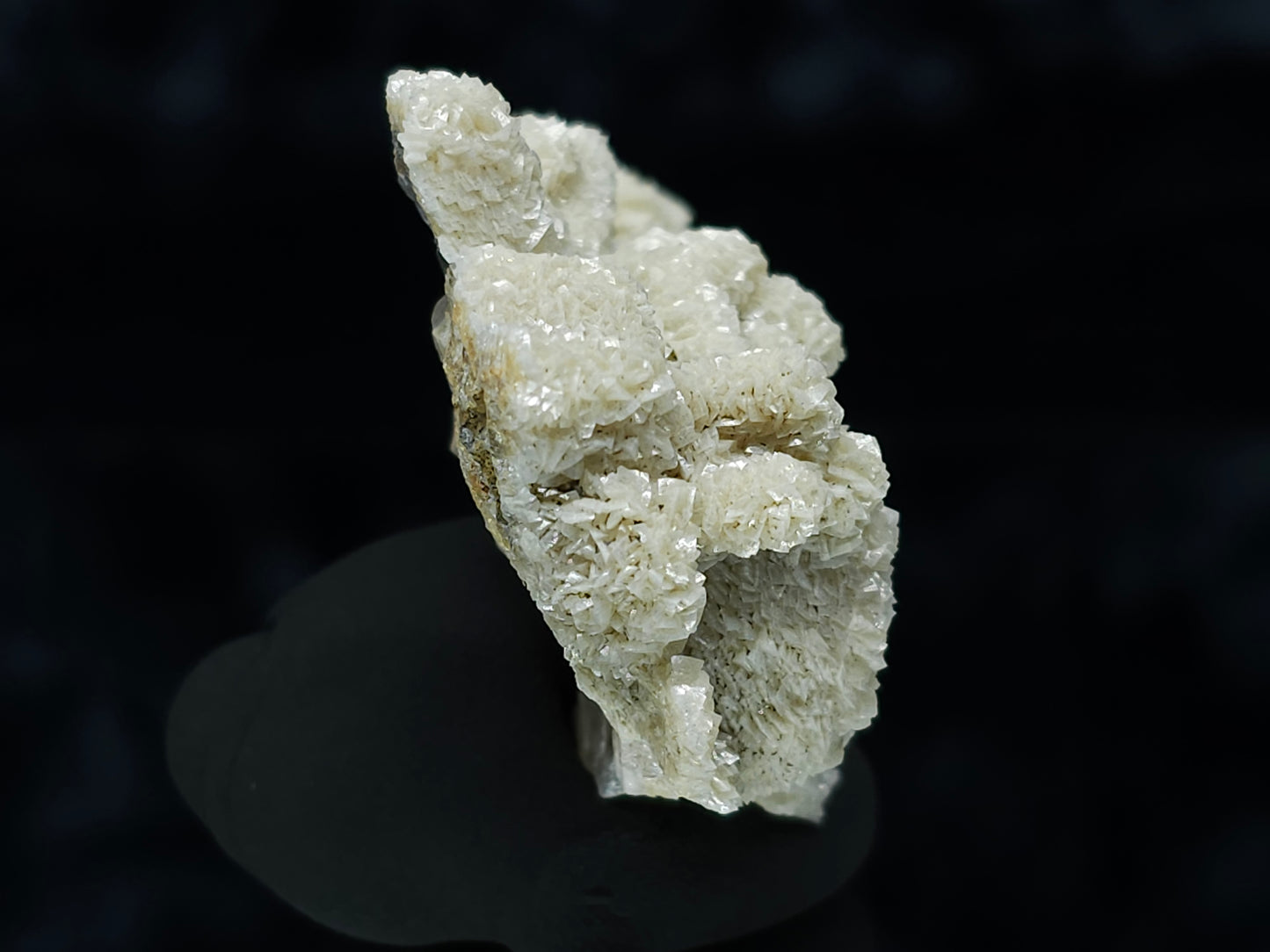 #88022 Cream-white Calcite pseudomorph after uncommon Calcite formation