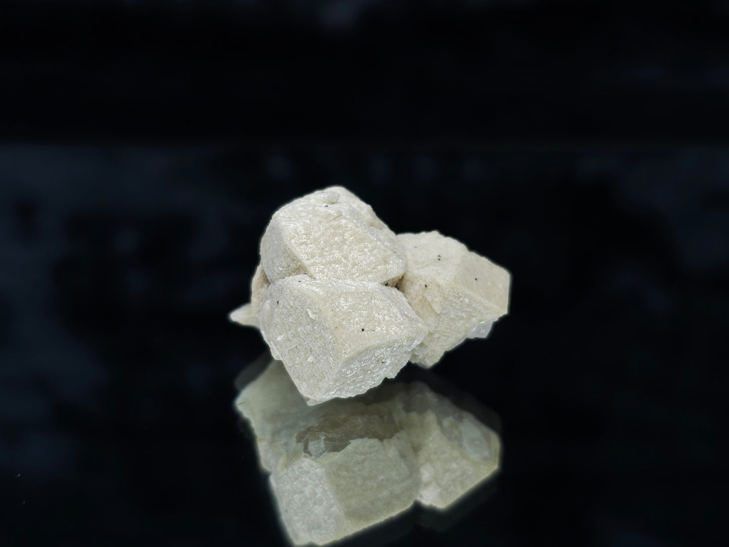#88024 Hematite on cream-white Calcite pseudomorph after triple Combined form Calcite