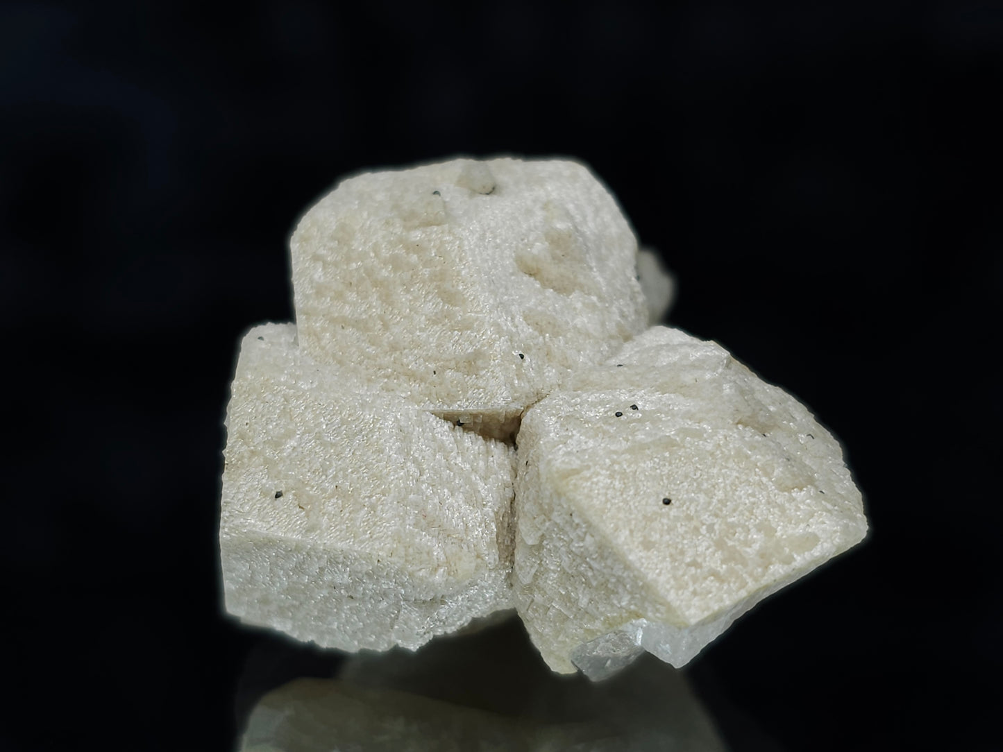 #88024 Hematite on cream-white Calcite pseudomorph after triple Combined form Calcite