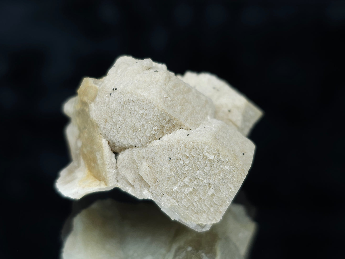 #88024 Hematite on cream-white Calcite pseudomorph after triple Combined form Calcite