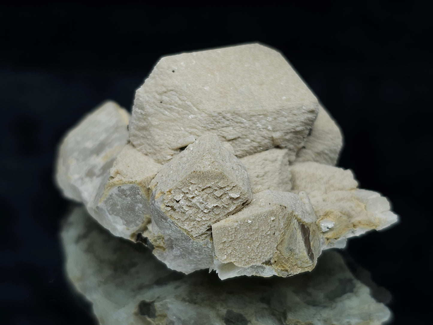 #88025 Hematite on cream-white Calcite pseudomorph after triple Combined form Calcite