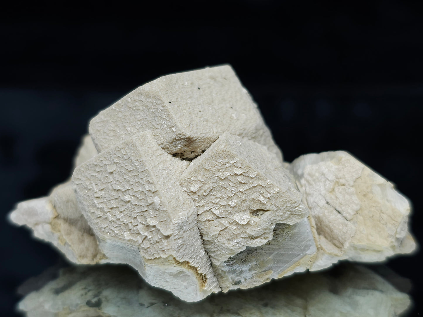#88025 Hematite on cream-white Calcite pseudomorph after triple Combined form Calcite