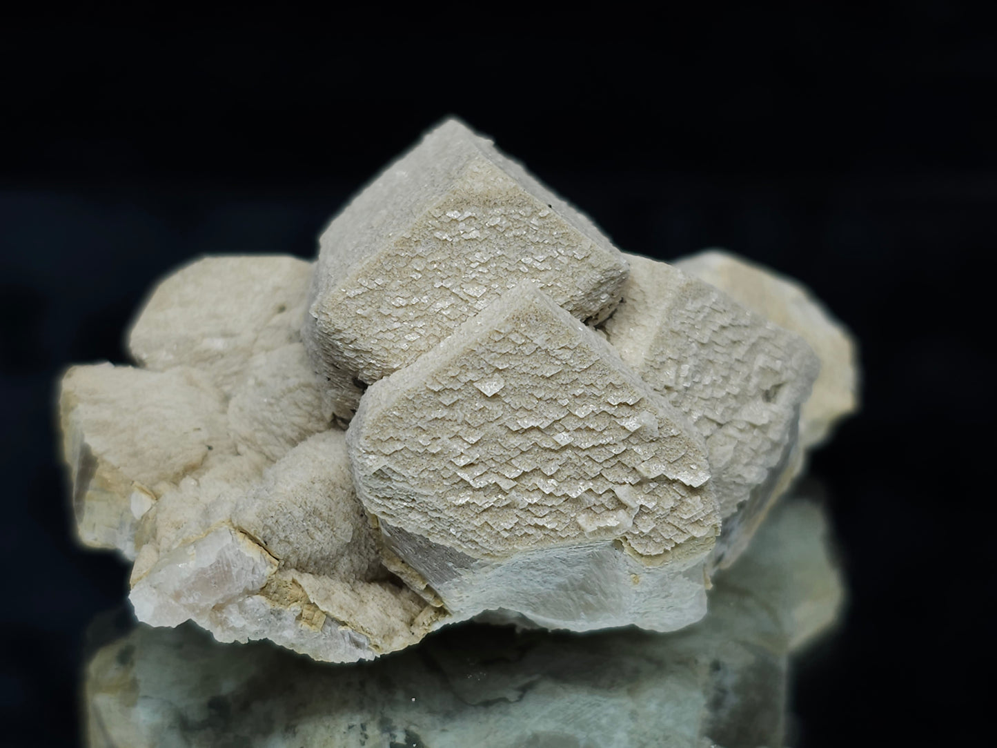 #88025 Hematite on cream-white Calcite pseudomorph after triple Combined form Calcite