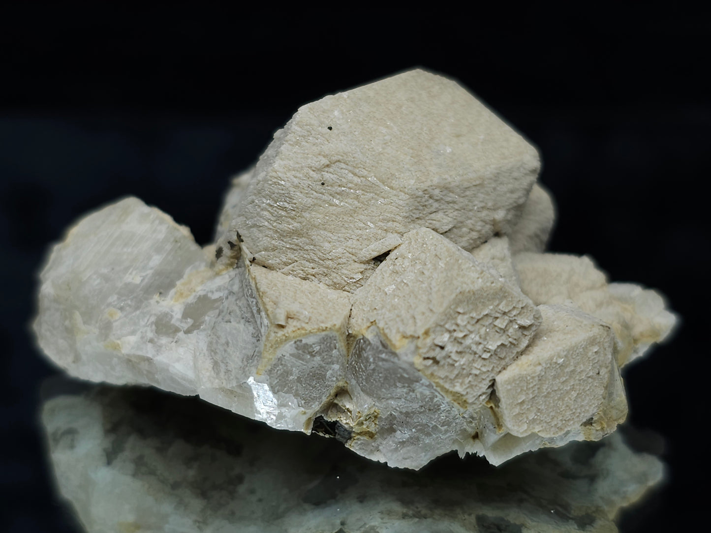 #88025 Hematite on cream-white Calcite pseudomorph after triple Combined form Calcite