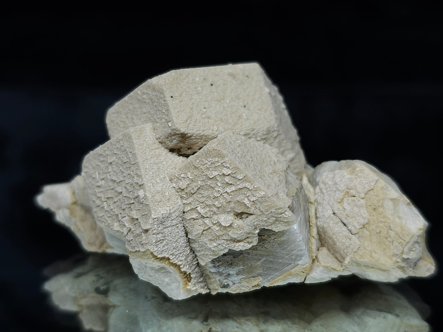 #88025 Hematite on cream-white Calcite pseudomorph after triple Combined form Calcite