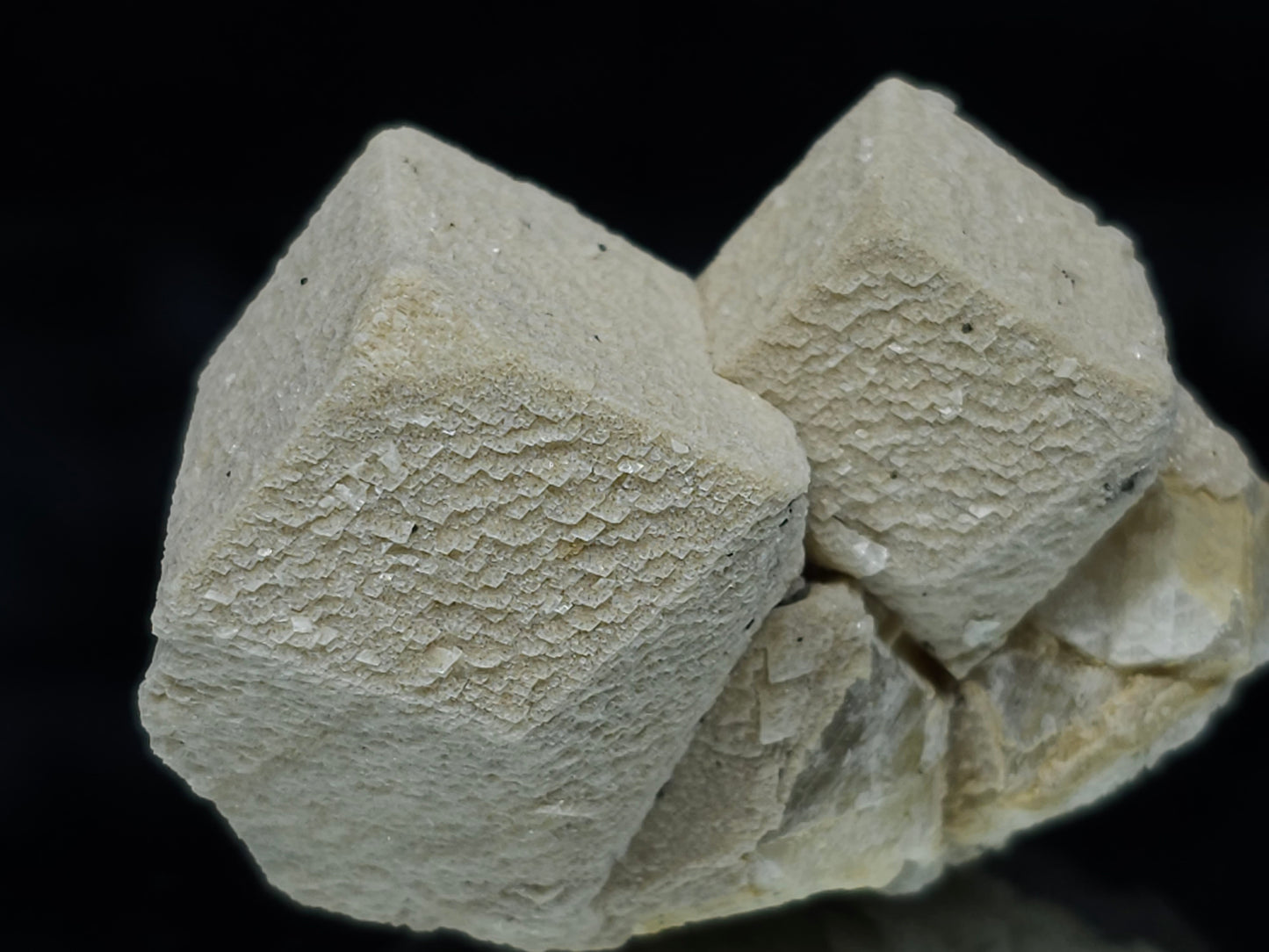 #88026 Hematite on cream-white Calcite pseudomorph after twin Combined from Calcite
