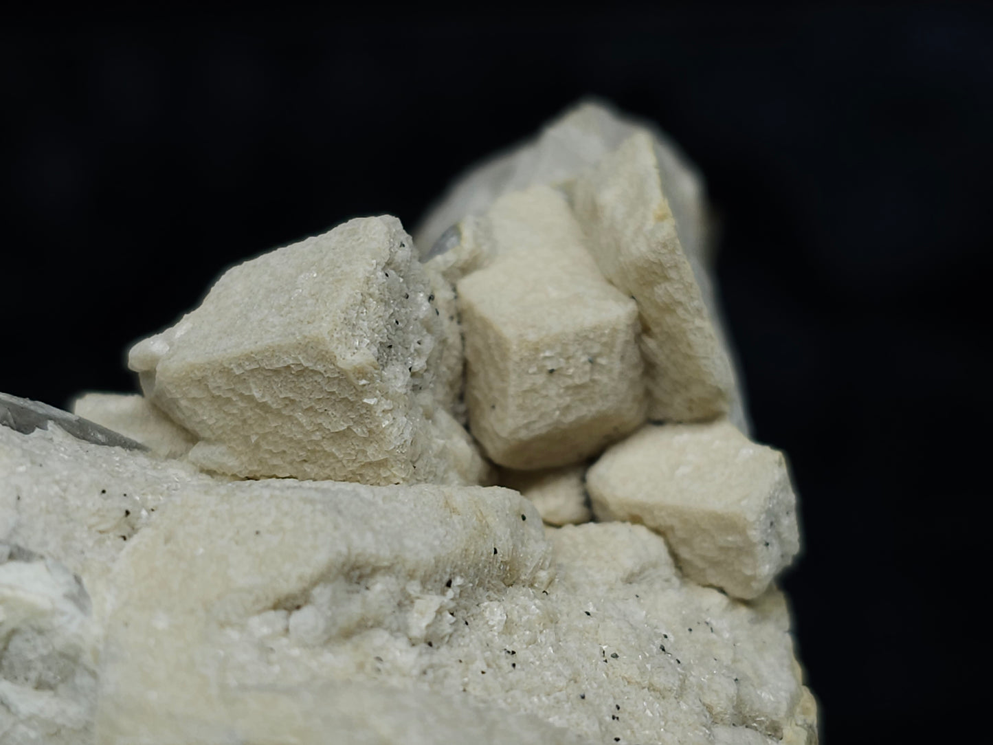 #88029 Hematite on cream-white Calcite pseudomorph after Combined form Calcite on matrix