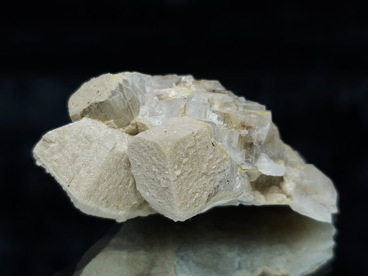 #88031 Hematite on cream-white Calcite pseudomorph after Combined form Calcite