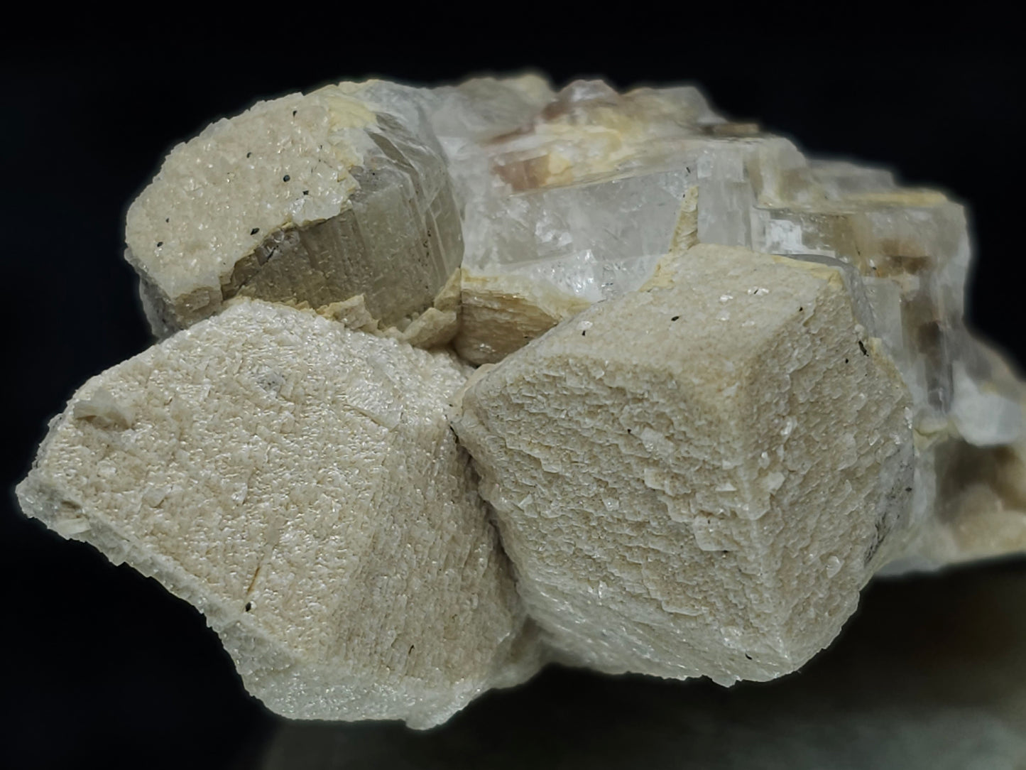 #88031 Hematite on cream-white Calcite pseudomorph after Combined form Calcite