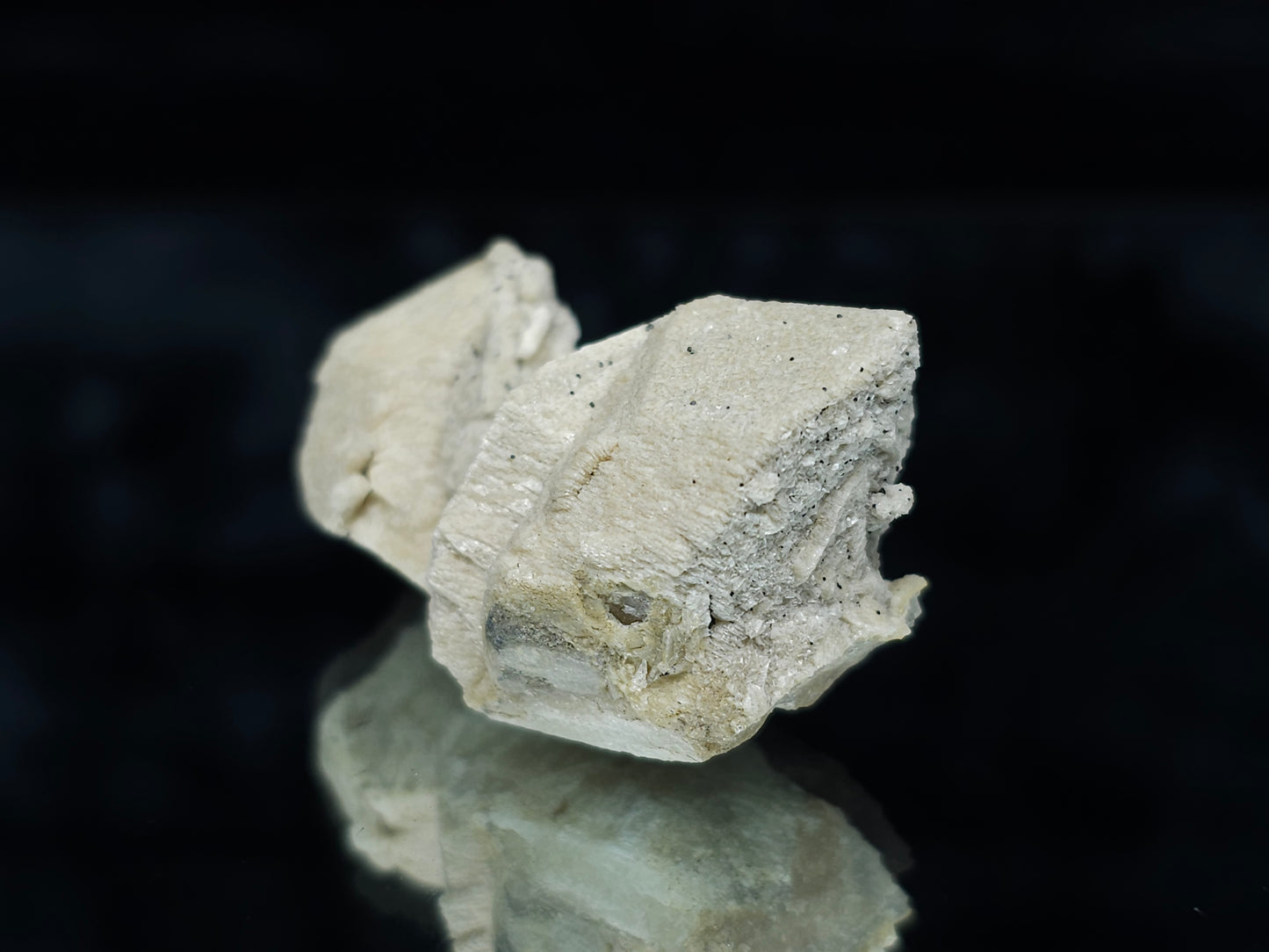 #88032 Hematite on cream-white Calcite pseudomorph after triple Combined form Calcite