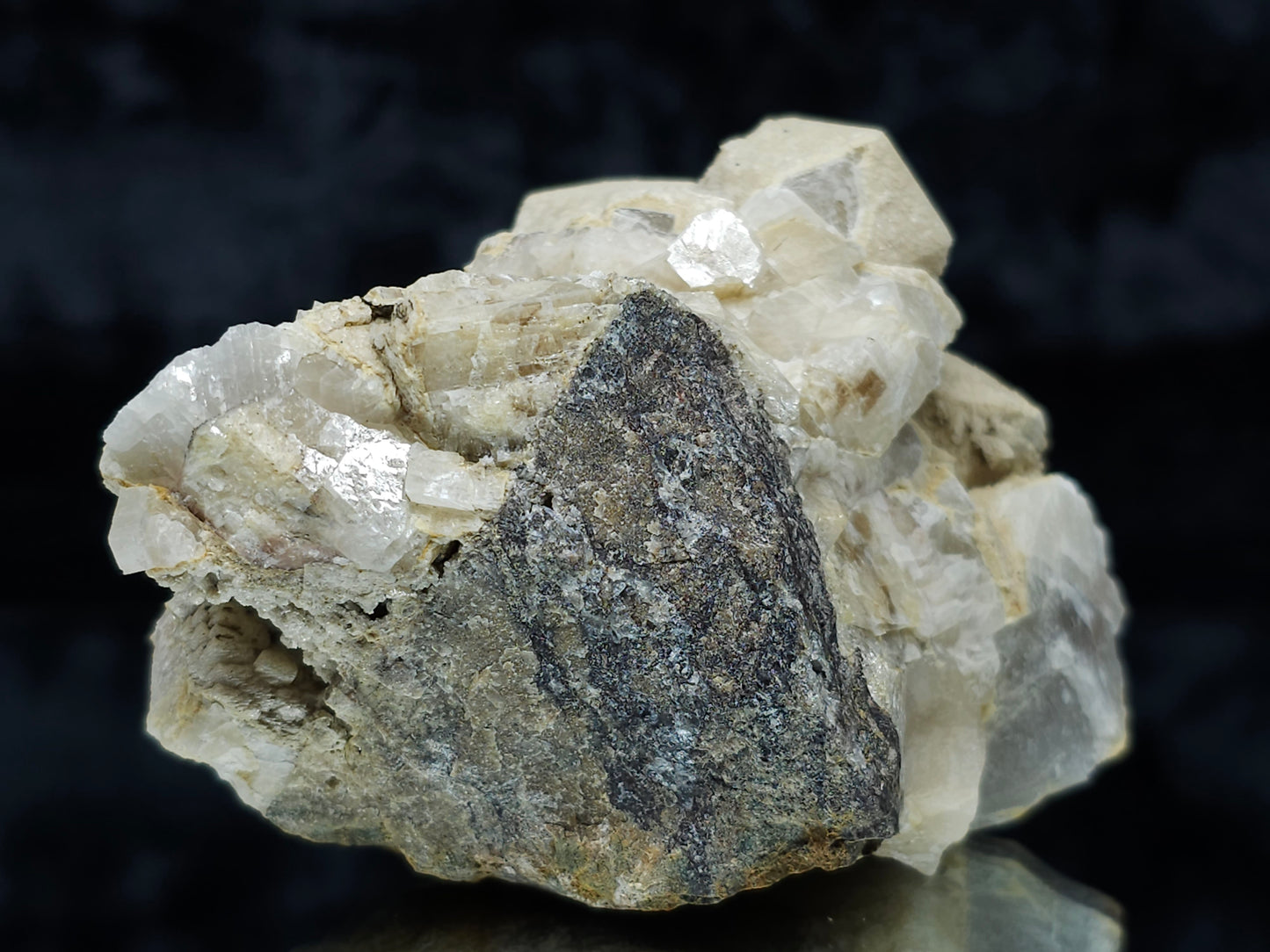 #88035 Cream-white Calcite pseudomorph after Combined form Calcite on Calcite matrix