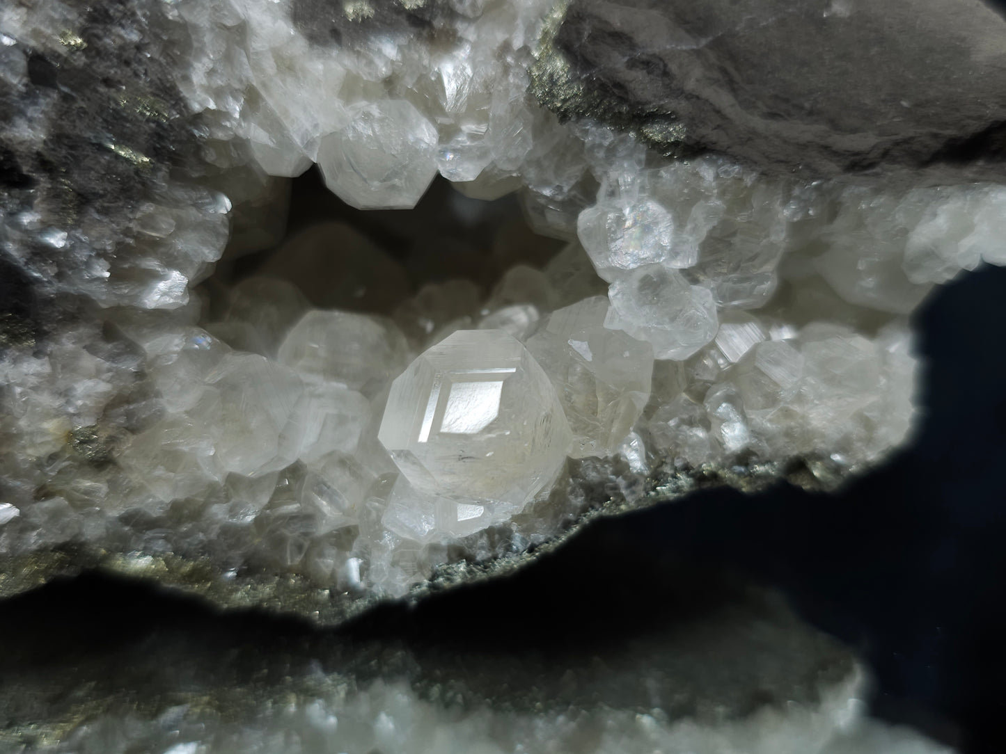 #33122 Super clear Nailhead Spar Calcite geode with Chalcopyrite ore and multiple small fossils in the matrix