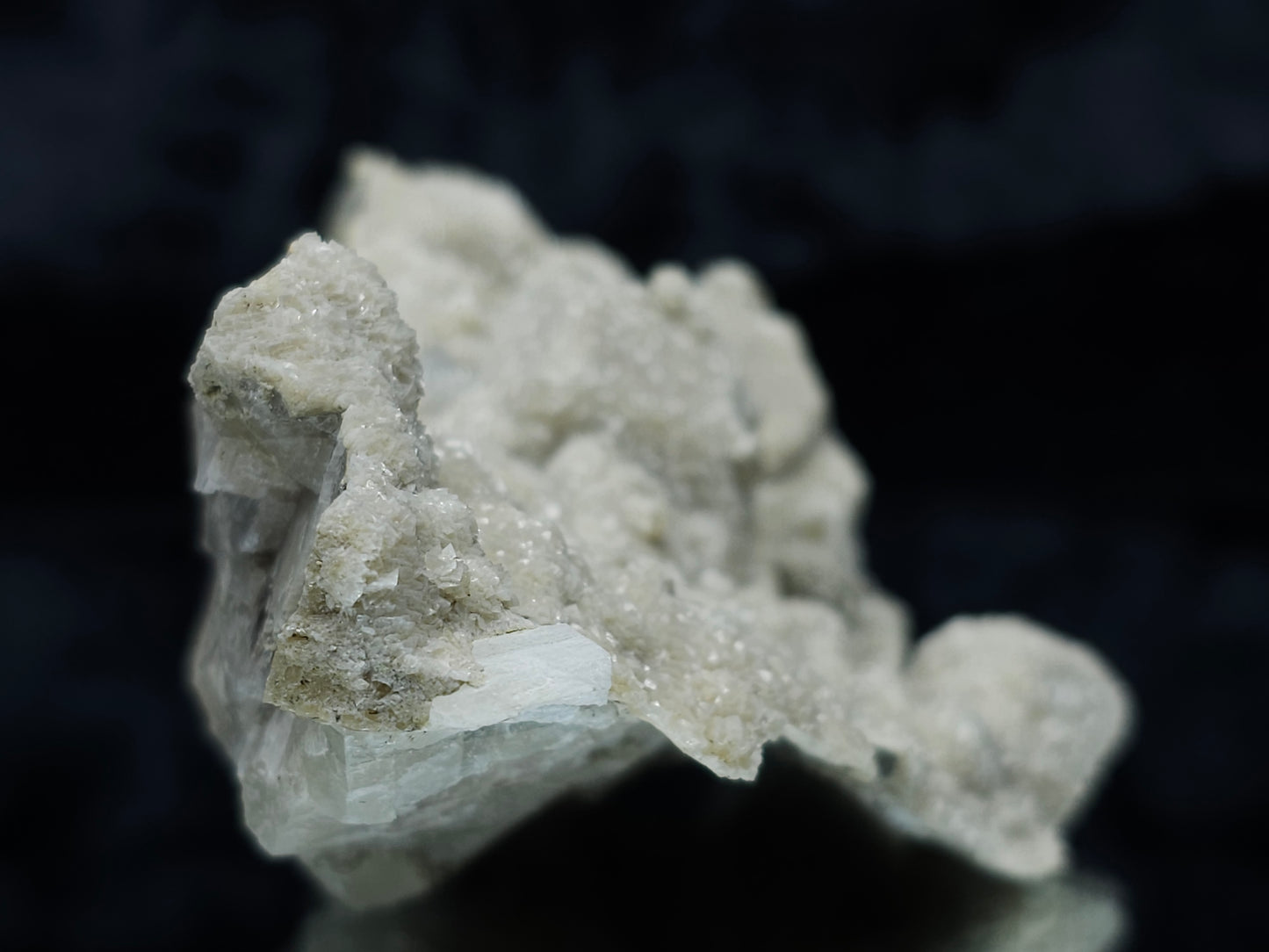 #88078 White Calcite, heavily striated, complex rhombohedral-scalenohedral ( pseudomorph ) after rare Combined form Calcite on matrix