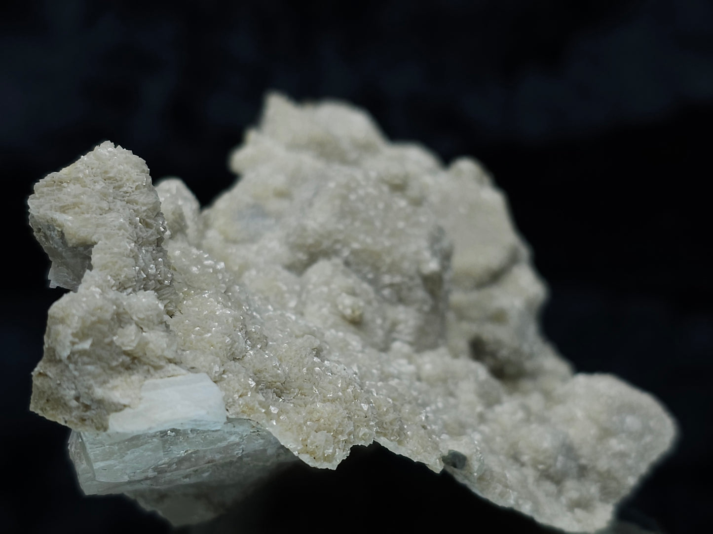 #88078 White Calcite, heavily striated, complex rhombohedral-scalenohedral ( pseudomorph ) after rare Combined form Calcite on matrix
