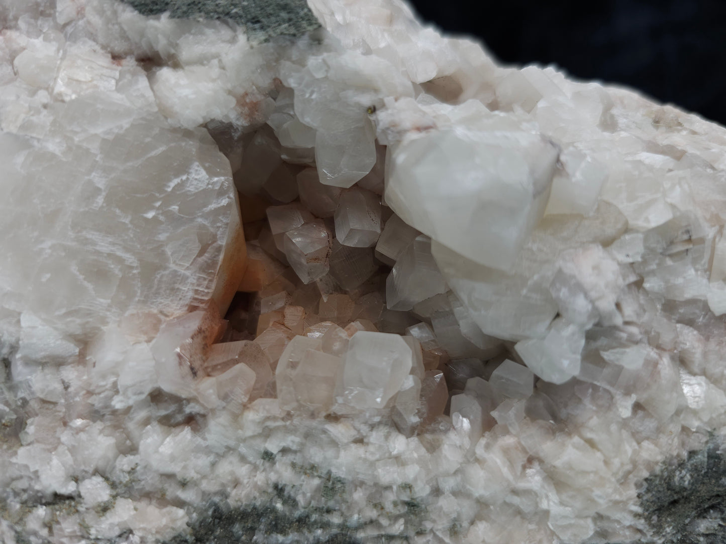 #11072 White and clear Combined form Calcite with Hematite inclusions on matrix